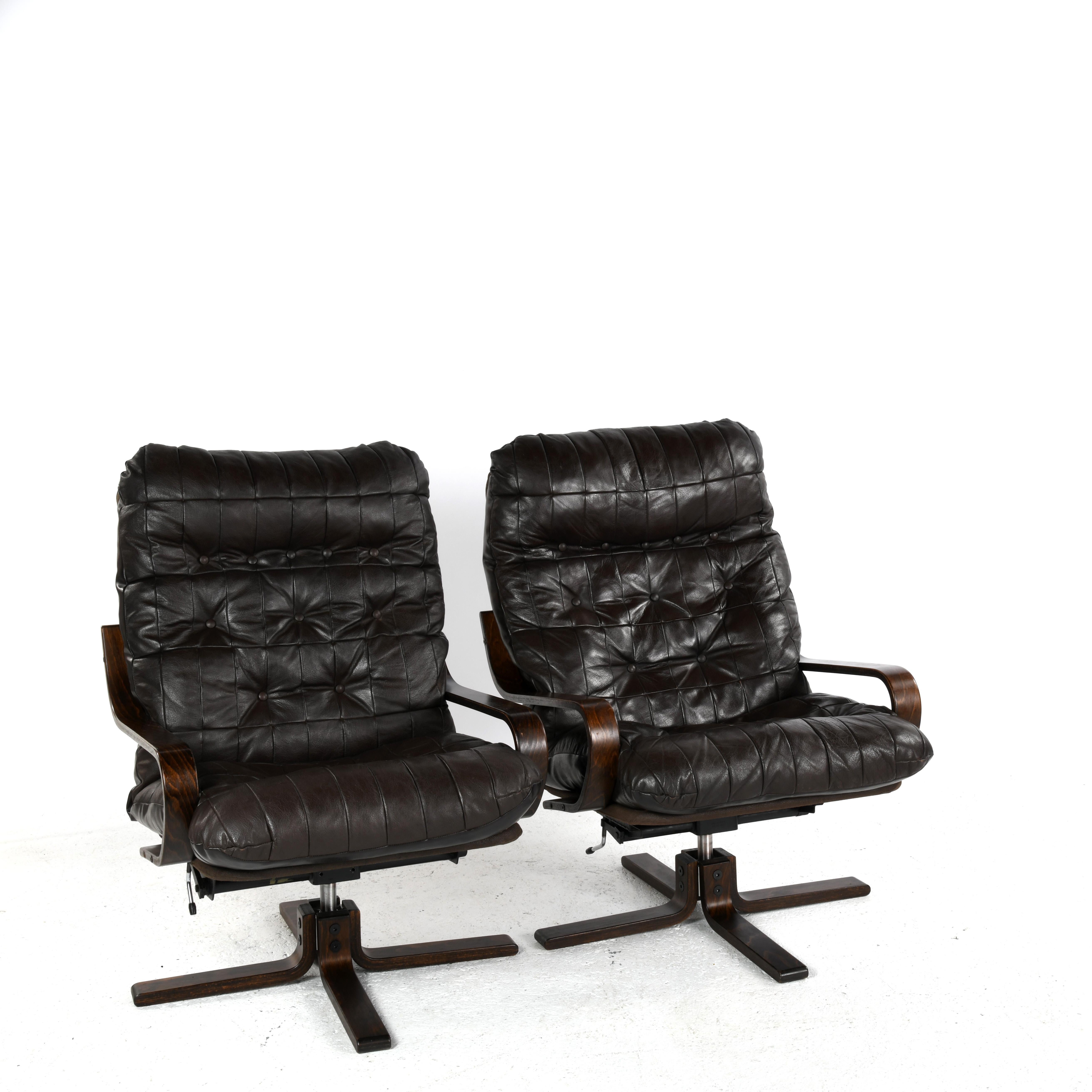 Norwegian Pair of vintage leather lounge chairs