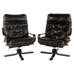 Pair of vintage leather lounge chairs