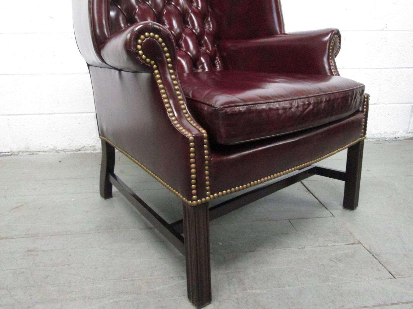 Mid-20th Century Pair of Vintage Leather Tufted Wingback Chairs For Sale