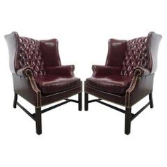 Pair of Vintage Leather Tufted Wingback Chairs