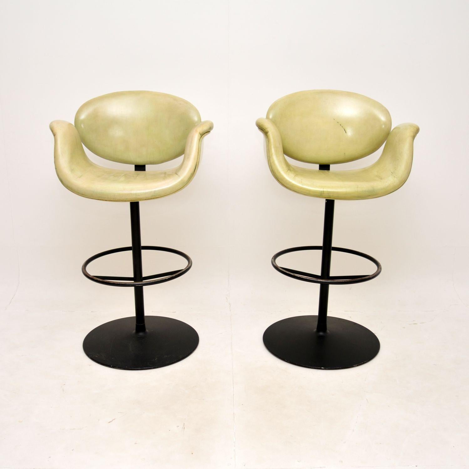 A magnificent pair of vintage leather tulip bar stools by Pierre Paulin. They were originally designed in 1965, this set were made in the Netherlands by Artifort, they date from around the 1970-80’s.

The quality is exceptional, they are beautifully