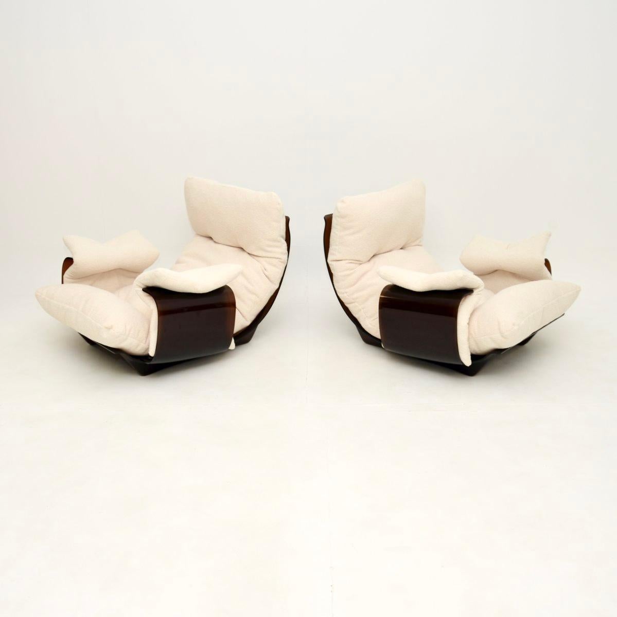 An extremely stylish and iconic pair of vintage Ligne Roset Marsala armchairs, made in France and dating from the 1970’s.

They are of amazing quality, with wonderful low slung acrylic frames. They have a beautiful curvaceous design and are very