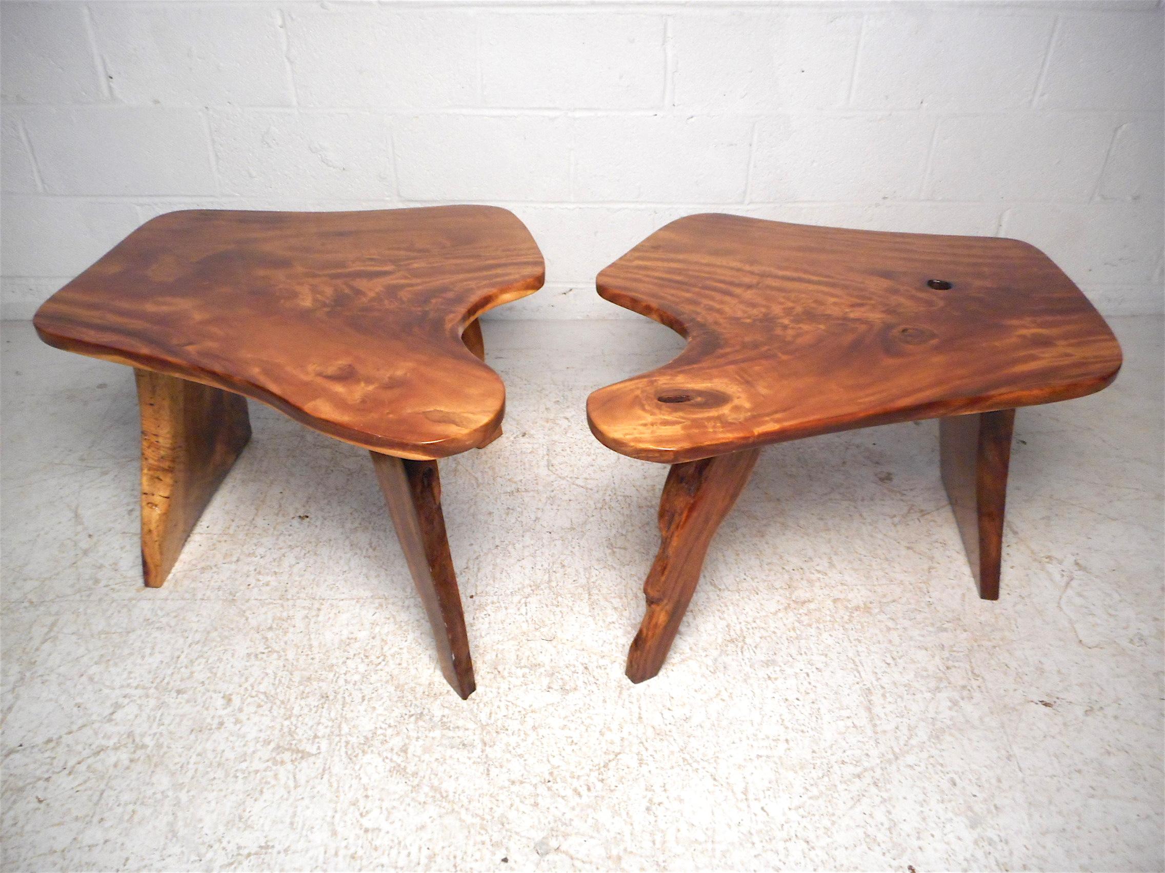 Impressive pair of live-edge tree slab tables. Perfect for use as end/side tables. Sleek and smooth lacquered finish. Beautiful wood grain pattern along the tabletop and the slab leg supports. This pair is sure to add a lively dimension to any