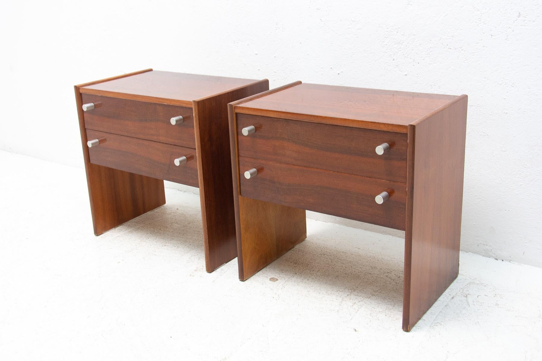 These Vintage ladies desks were made by UP Zavody company in the former Czechoslovakia in the 1980´s. Features a simple design, mahogany veneer. Overall in very good Vintage condition. Price is for the pair.

Measures: Height: 50 cm

width: 50