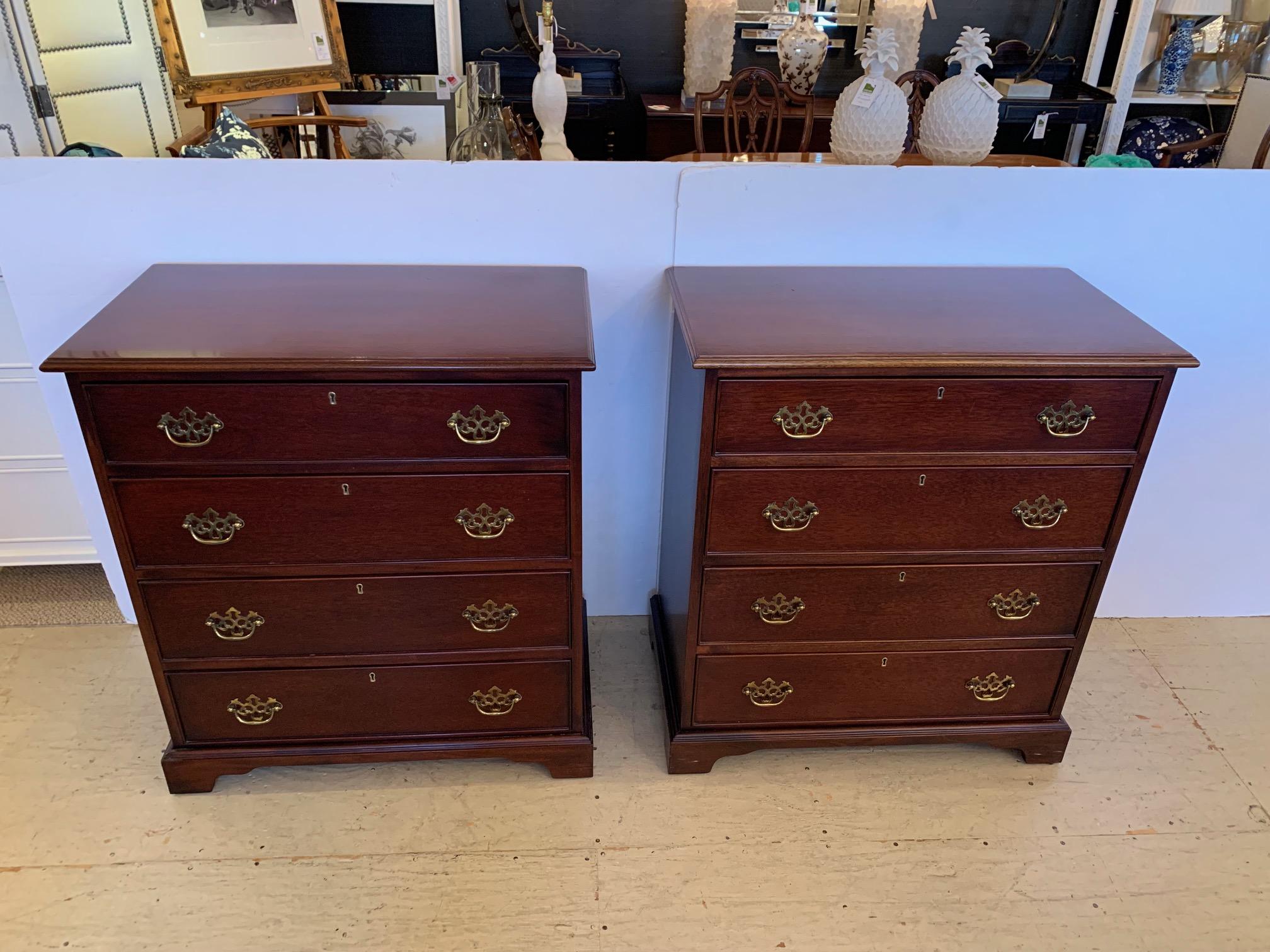 Handsome pair of Chippendale style mahogany bachelors chests having 4 drawers, brass hardware and keyholes.