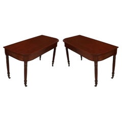Pair of Vintage Mahogany Demilune Tables with Fluted Legs and Wheels