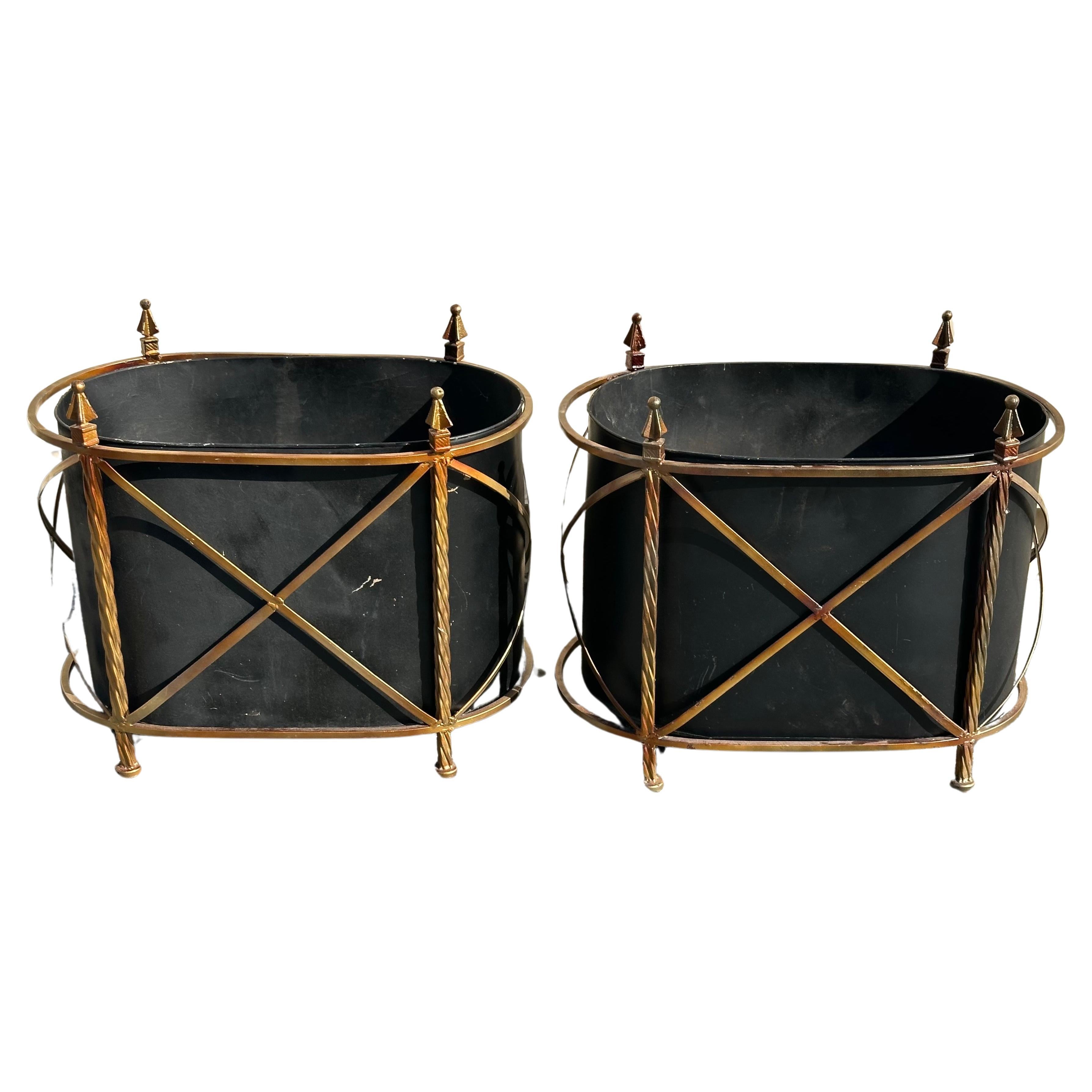 A very nice pair of vintage metal and wrought iron jardinieres / planters, circa 1970s. The planters are in good vintage condition and have a wonderful patina. They measure 23.5