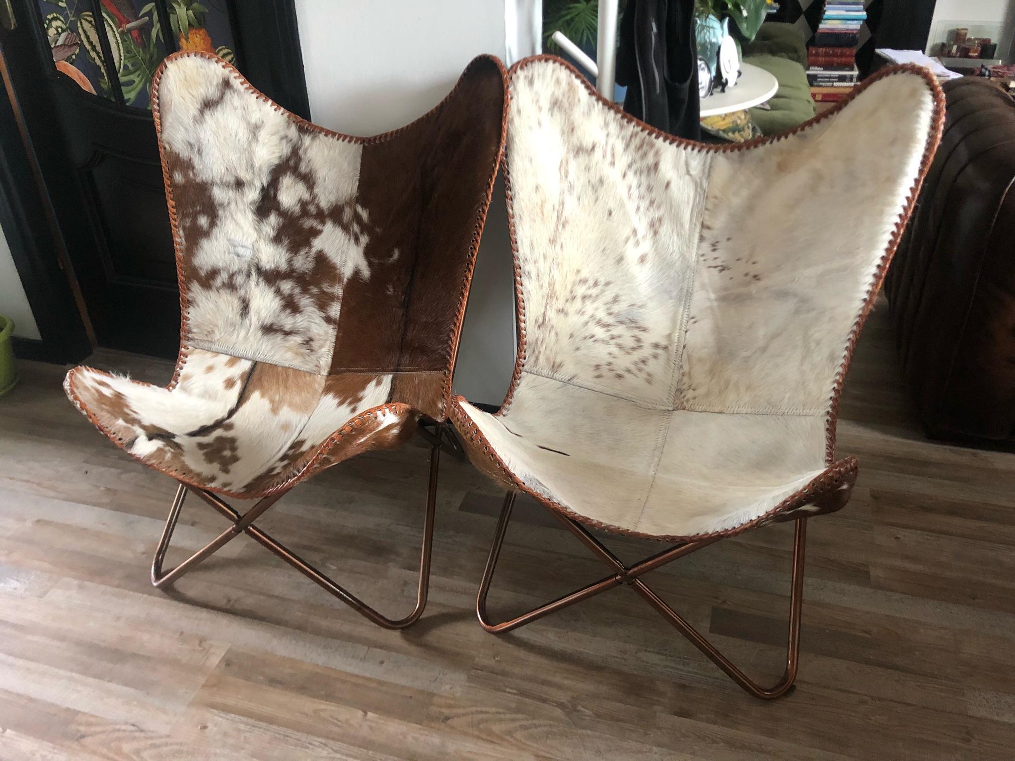 Pair of vintage armchairs, butterfly model (by knoll?) Similar to the famous Tripolina chair, with cowhide lining and removable copper-plated aluminum structure, very rare special edition in leather, built around 1960 in Germany.
In excellent state