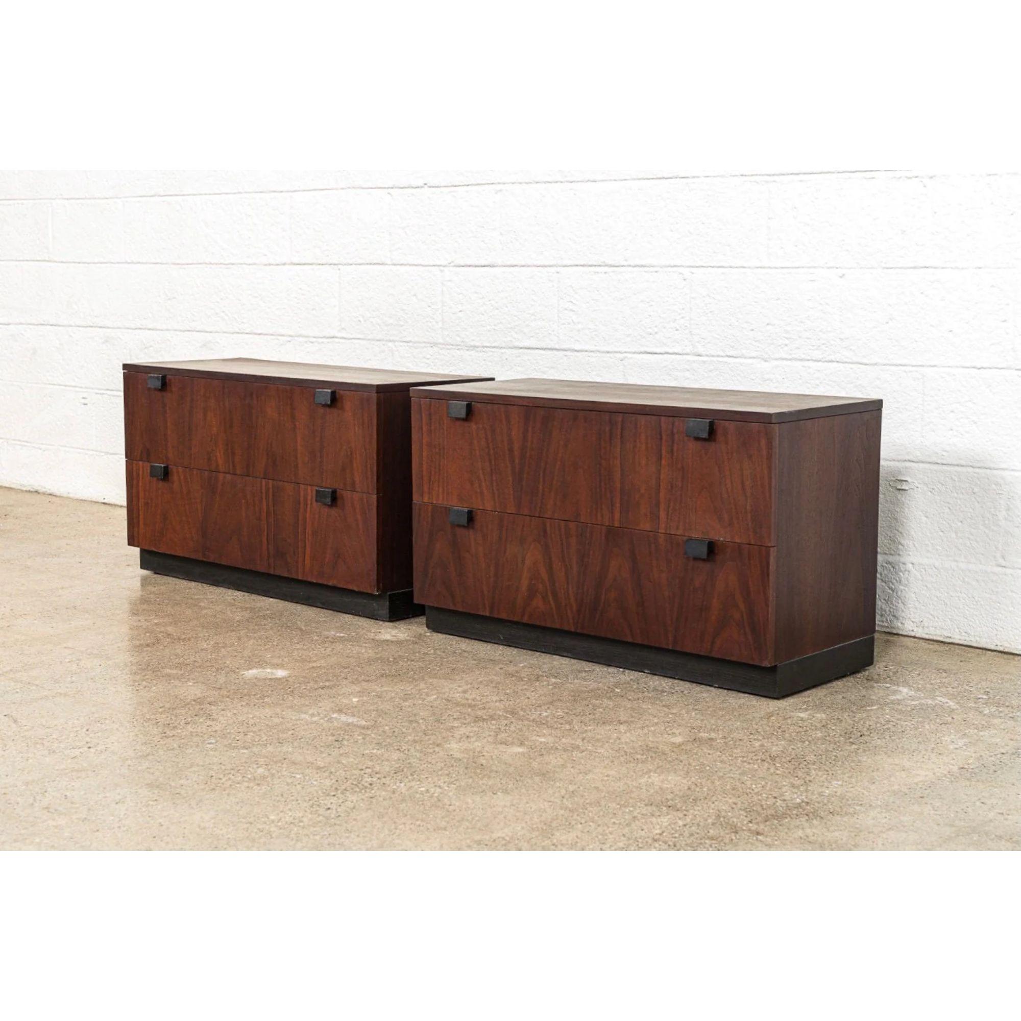 Vintage Mid Century Milo Baughman for Directional Wooden Nightstands

This pair of vintage Mid-Century Modern Milo Baughman for Directional nightstands are circa 1960. They feature gorgeous natural walnut wood grain, wide roomy drawers and black