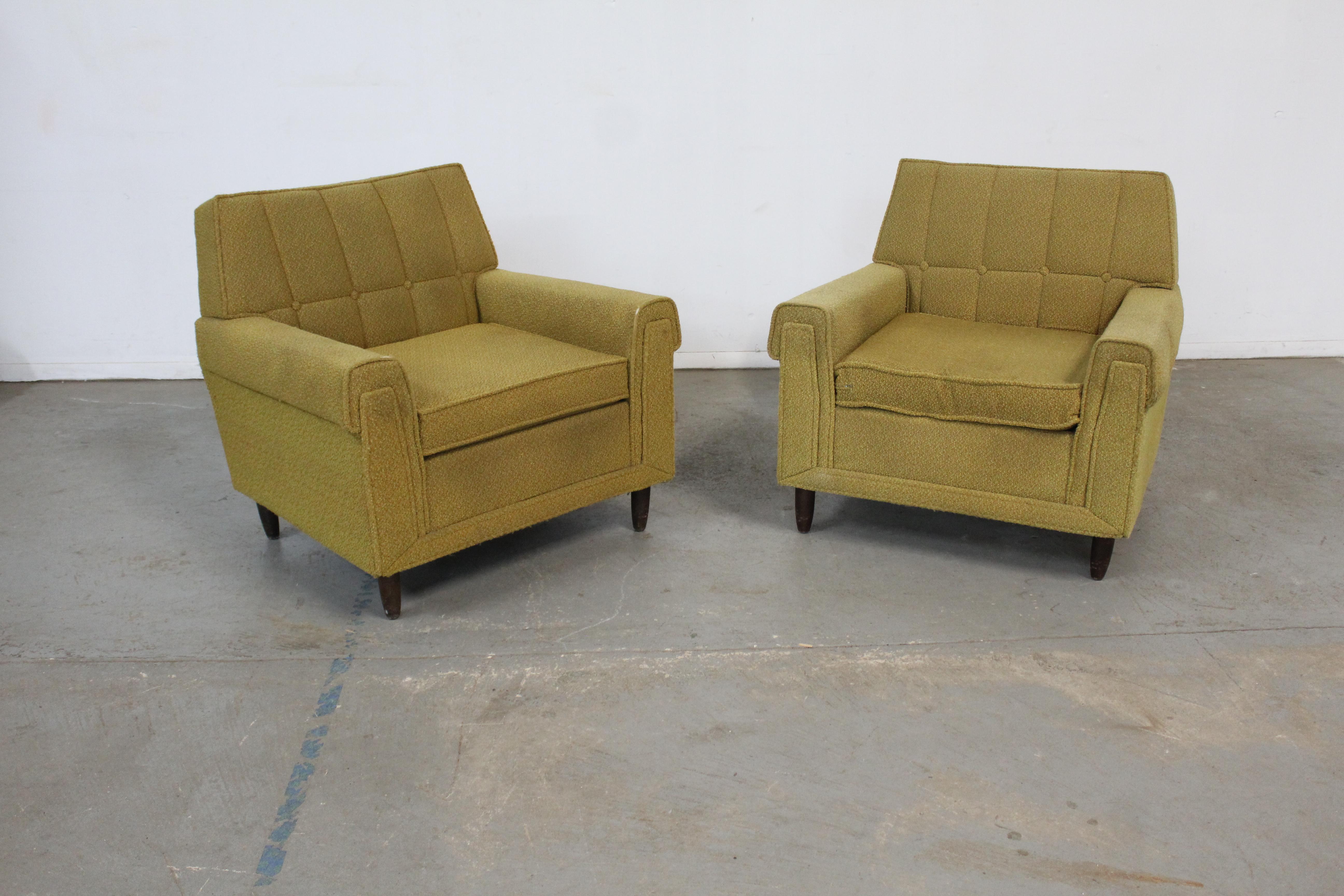 Pair of Vintage Mid-Century Kroehler Style lounge club chairs.

Offered is a pair of vintage Mid-Century Modern style lounge/club chairs. The pair is elevated on Pencil Legs. These chairs have great lines and are similar in style to Edward Wormley