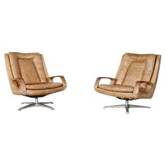 Coppia di sedie girevoli in pelle tedesche vintage della metà del secolo scorso di Carl Straub