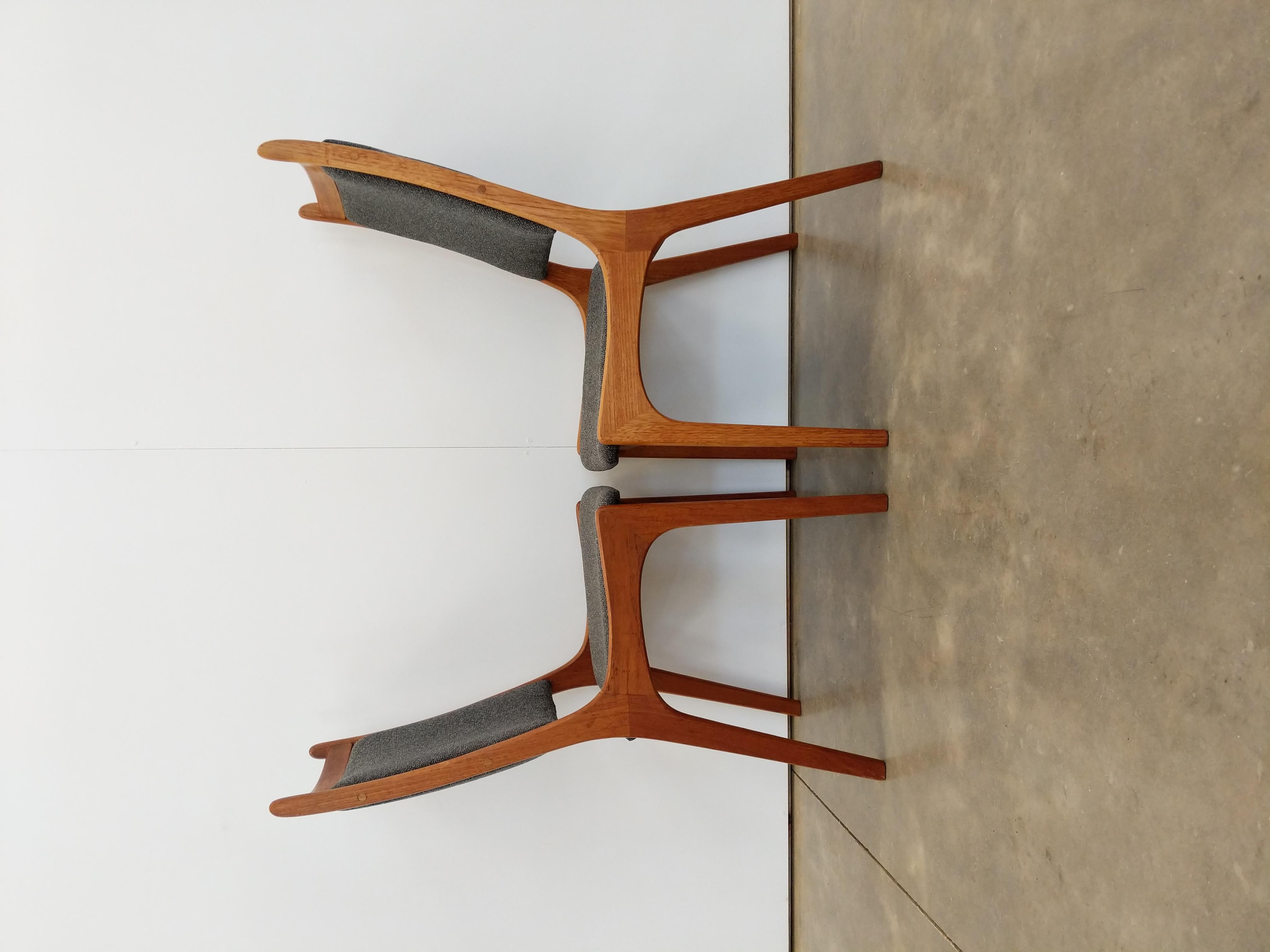 Pair of authentic vintage mid century modern dining chairs.

By Nordic Furniture.

Maker's stamp on bottom.

This set is in excellent refurbished condition with brand new Knoll upholstery.

If you would like any additional details, please contact