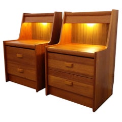 Coppia di comodini vintage in teak della metà del secolo scorso