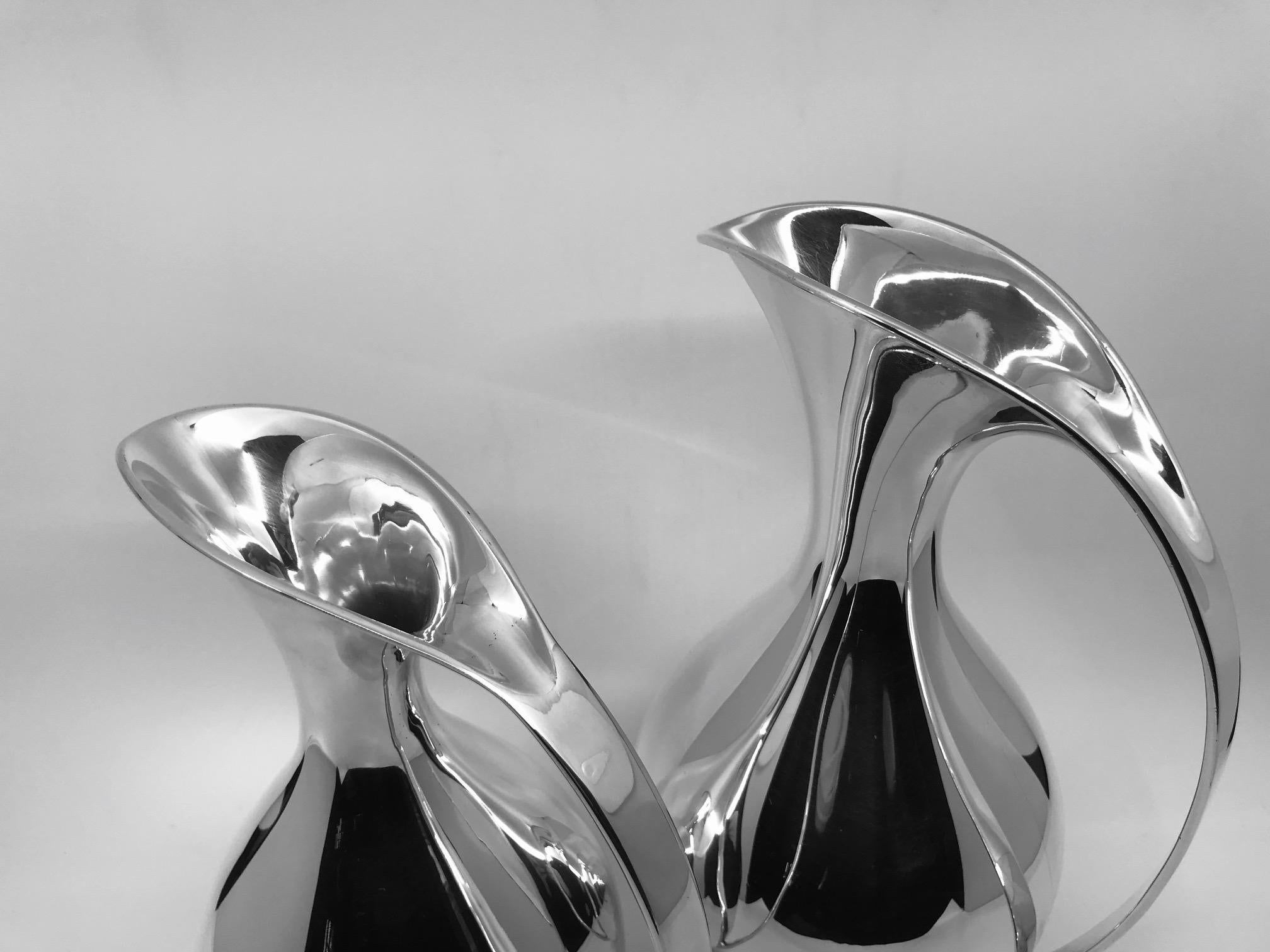 Modern Pair of Vintage Mid-Century Sterling Kay Fisker Pitchers For Sale