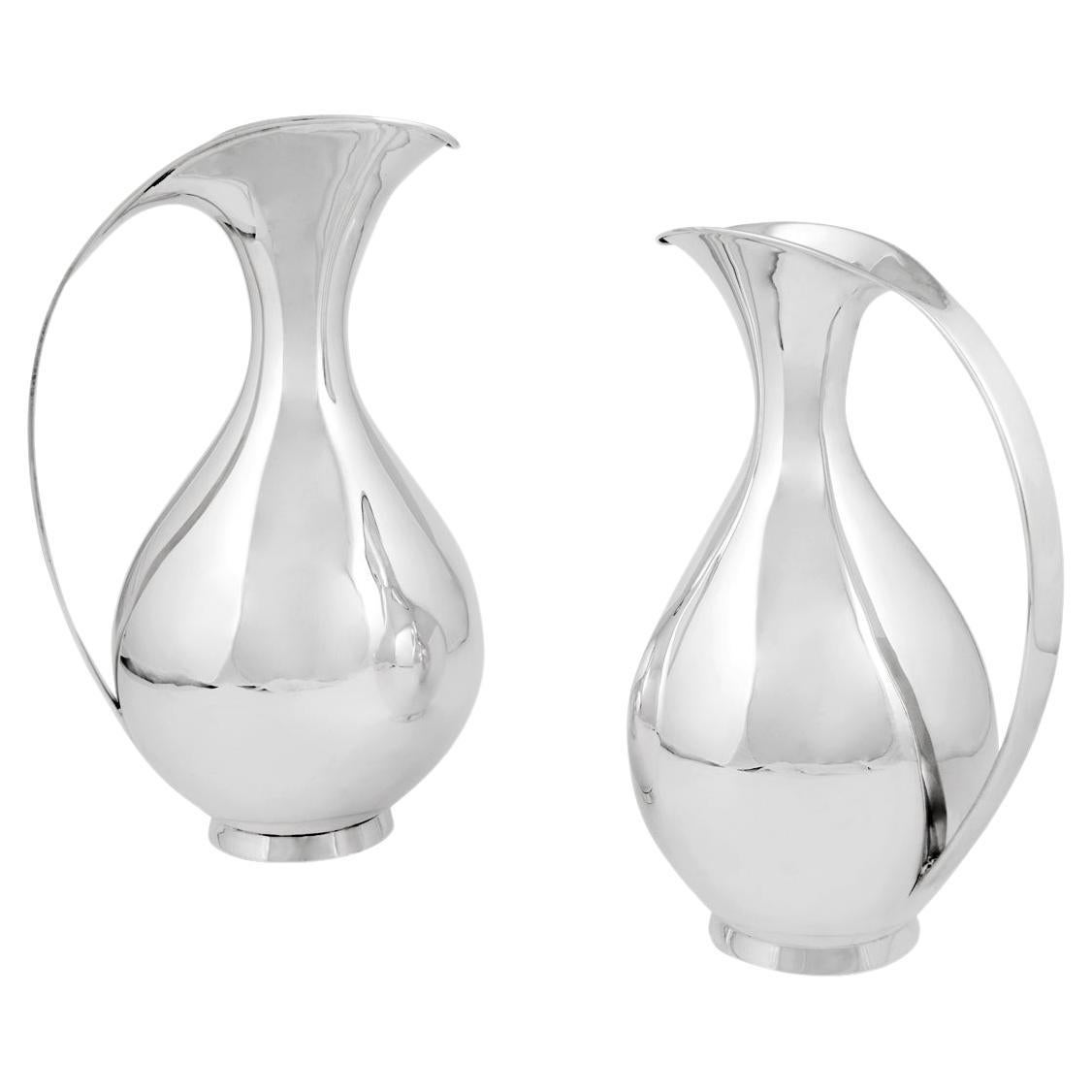 Pair of Vintage Mid-Century Sterling Kay Fisker Pitchers For Sale