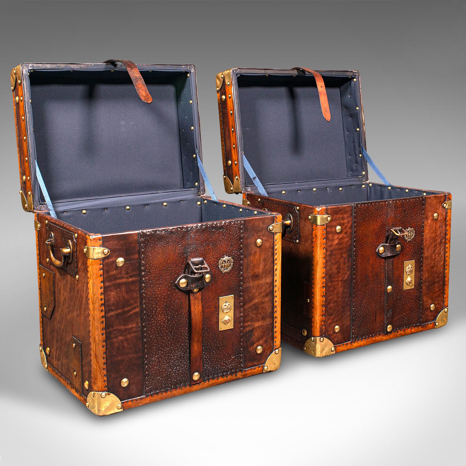 This is a pair of vintage campaign luggage cases. An English, leather and brass bound Lieutenant Colonel’s bedside nightstand, dating to the mid 20th century, circa 1950.

Captivating casework, graced with wonderful colour depth and
