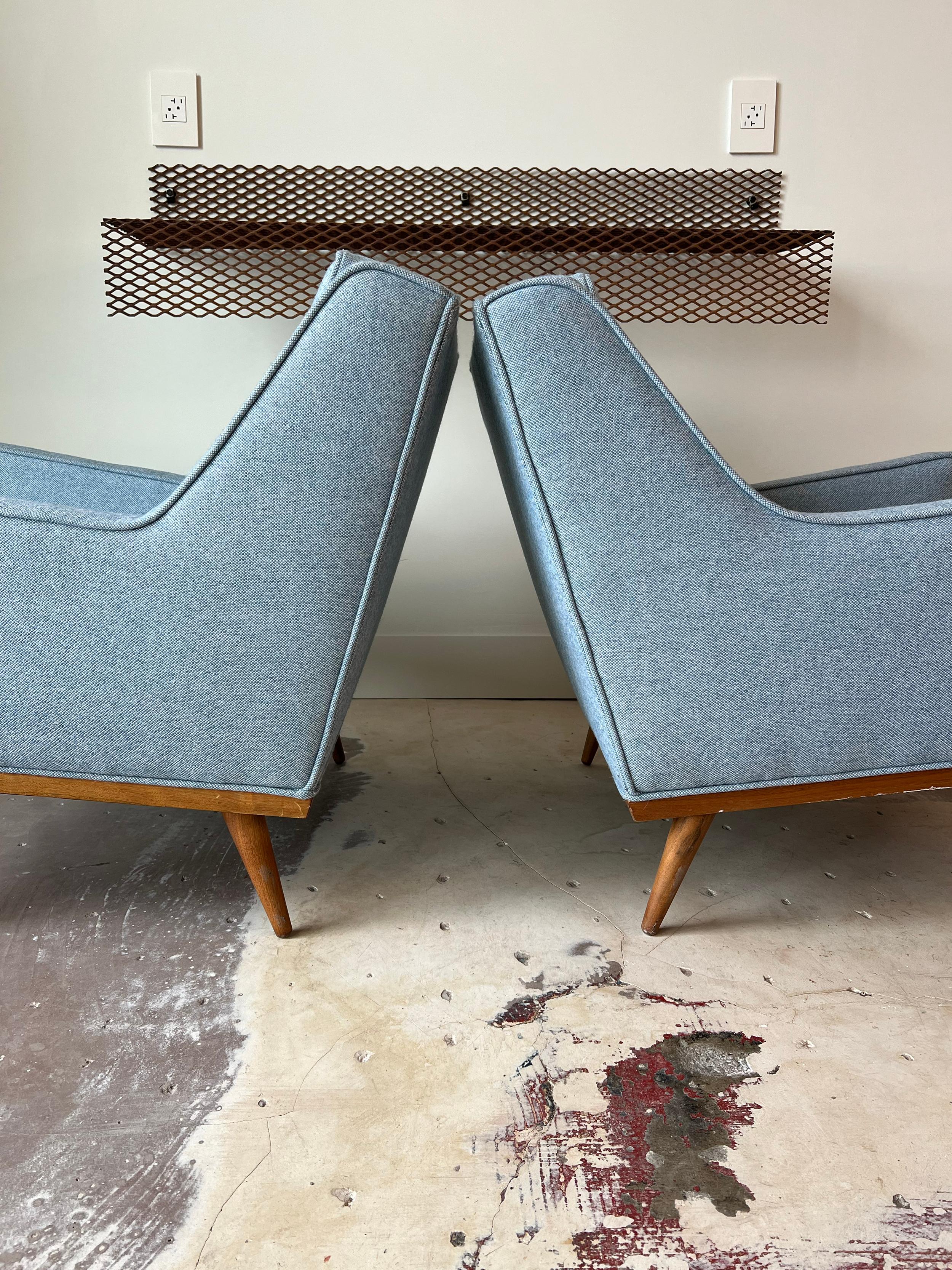 Pair of vintage club/lounge chairs by Milo Baughman for James Inc (Thayer Coggin). New upholstery done in soft Maharam wool Hallingdal and new foam throughout. Great pair of chairs with excellent profile lines and proportions. Ready for use.