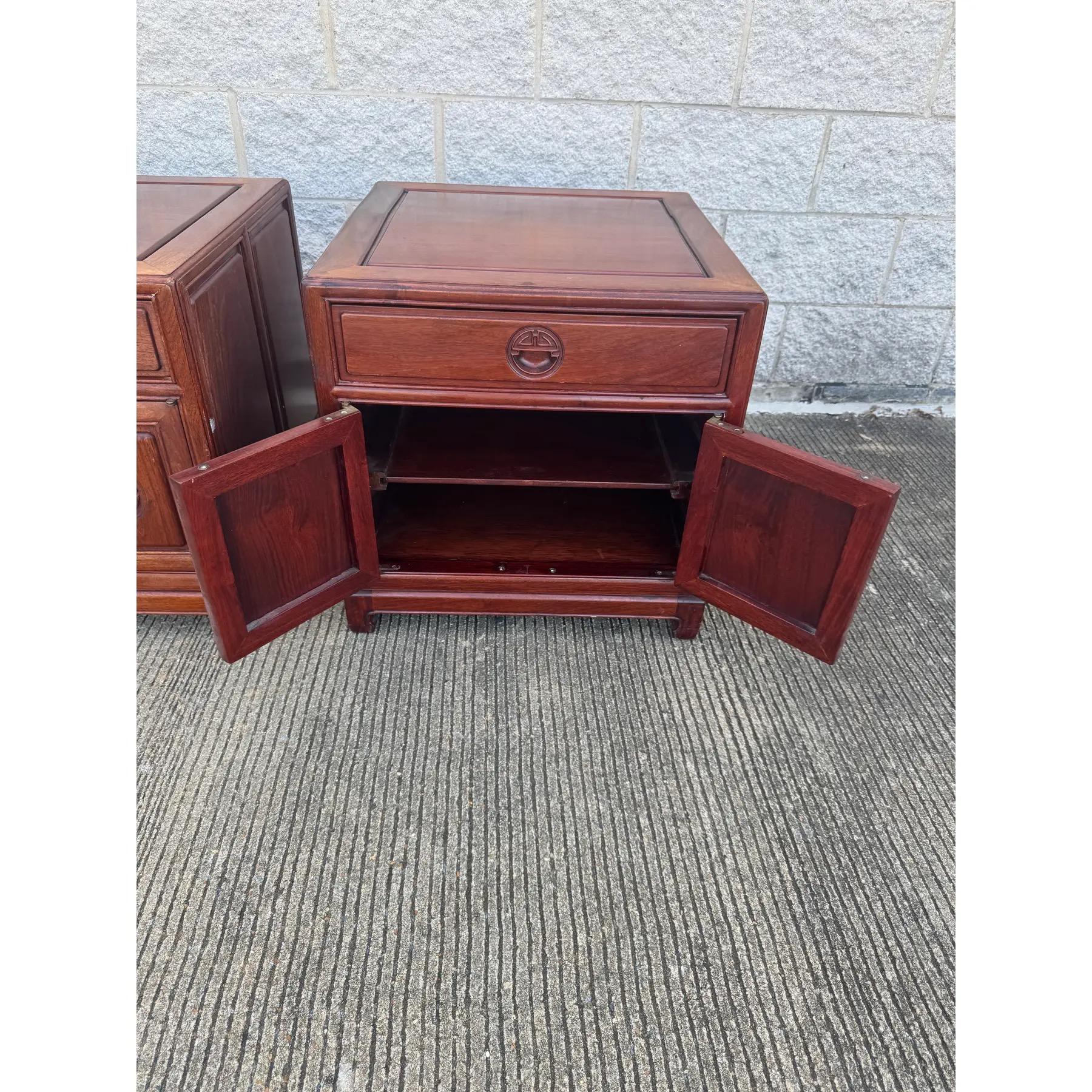 20th Century Pair of Vintage Ming-Style Rosewood Nightstands With Carved Medallion Doors For Sale