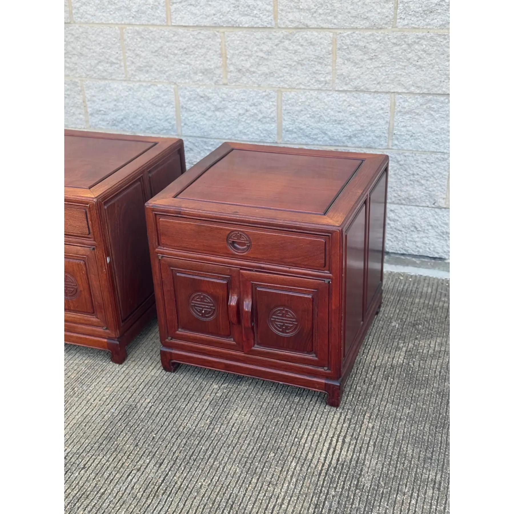 Metal Pair of Vintage Ming-Style Rosewood Nightstands With Carved Medallion Doors For Sale