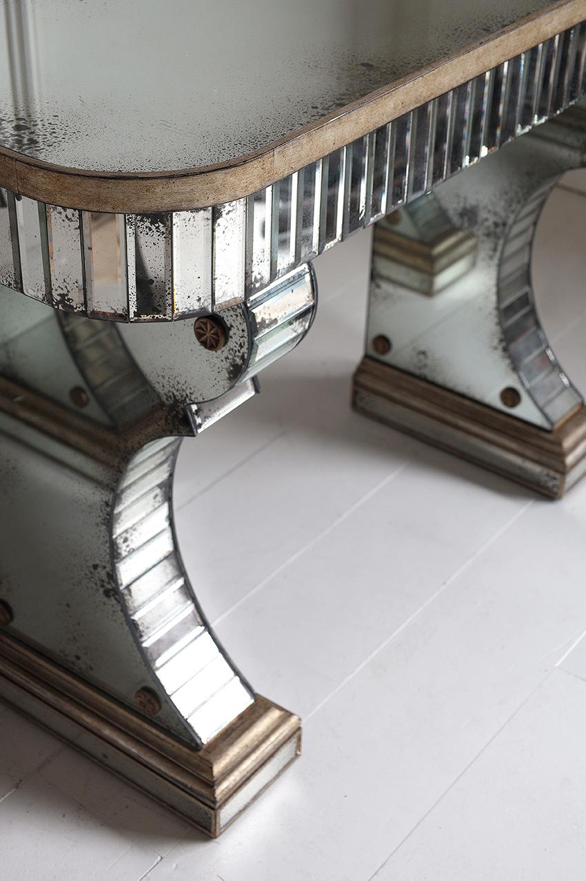Pair of vintage mirrored consoles in the style of Serge Roche.

