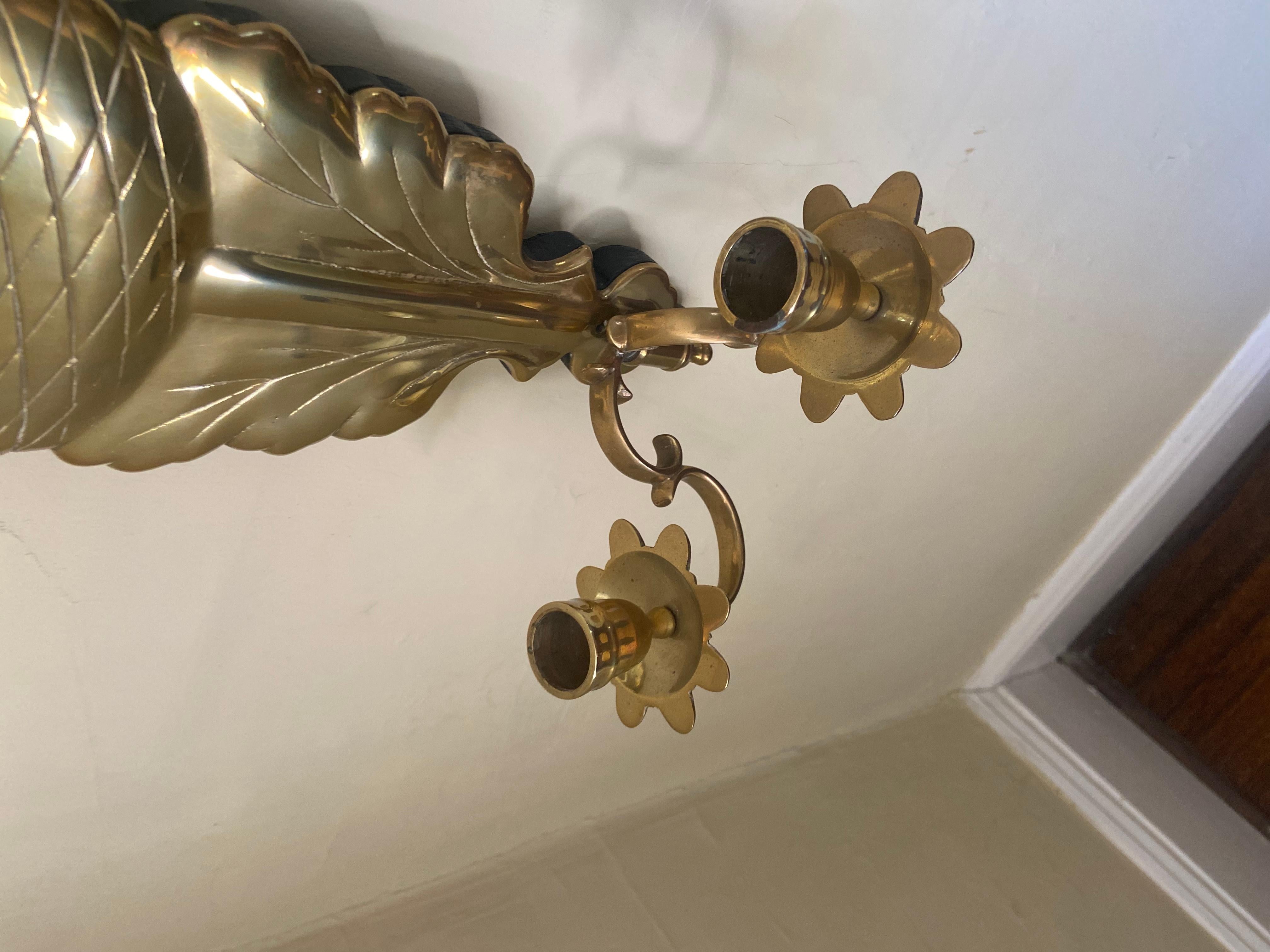 American Classical Pair of vintage mirrored sconces with brass oak leaf detail