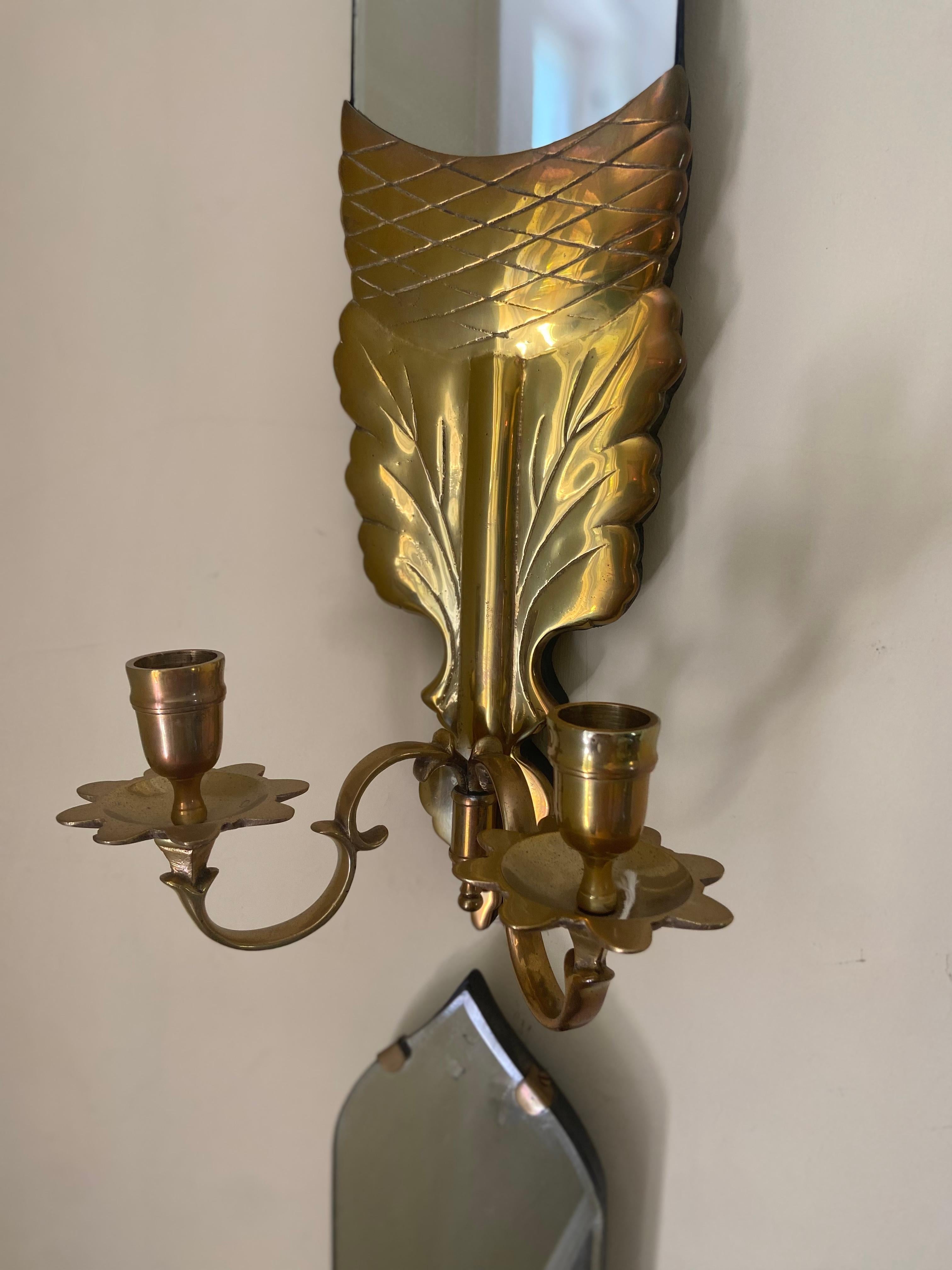 Pair of vintage mirrored sconces with brass oak leaf detail In Good Condition In Charlotte, NC