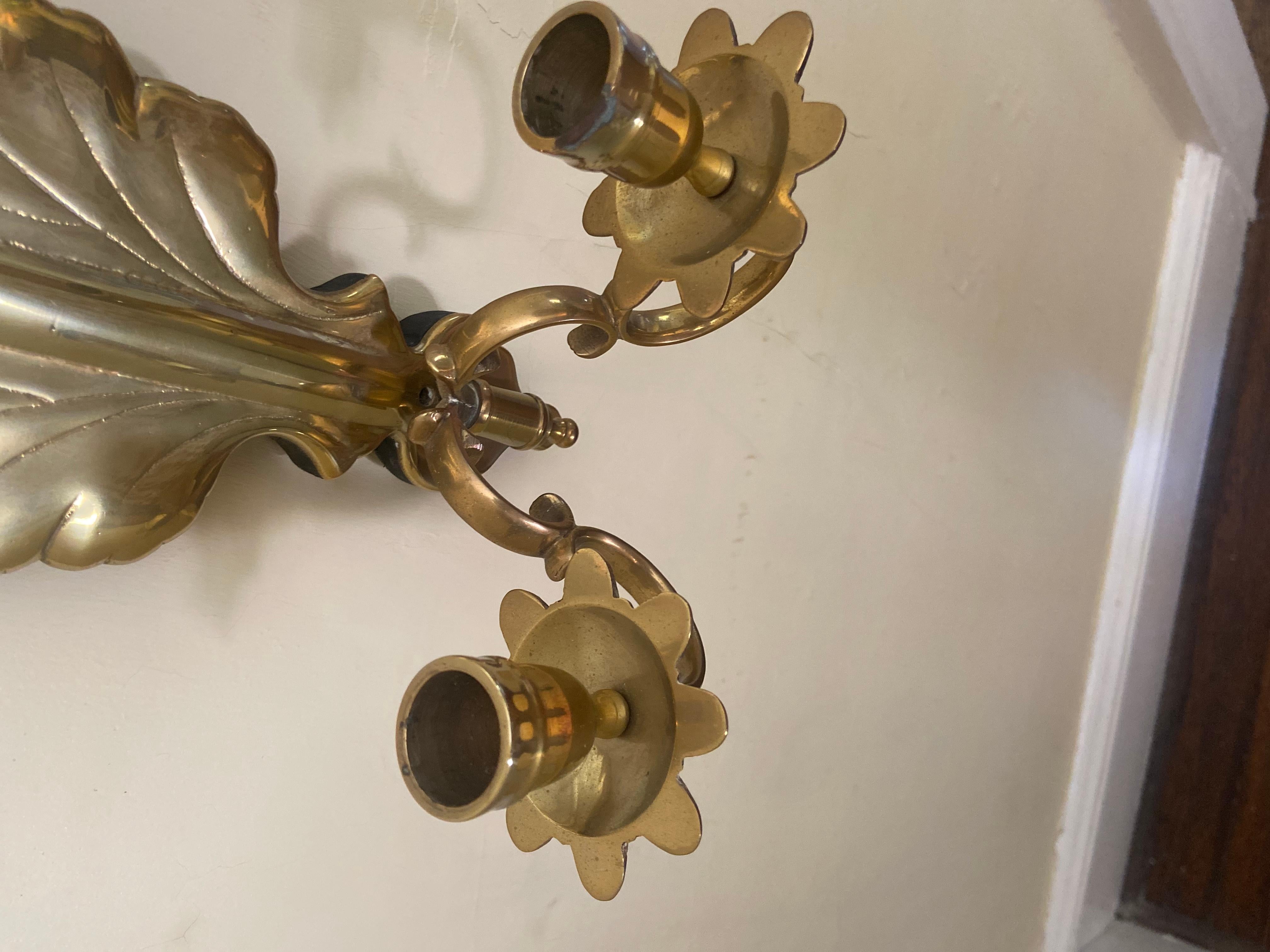 Brass Pair of vintage mirrored sconces with brass oak leaf detail