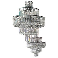 Pair of Vintage Modern Hollywood Regency Style Chandeliers in Crystal and Chrome