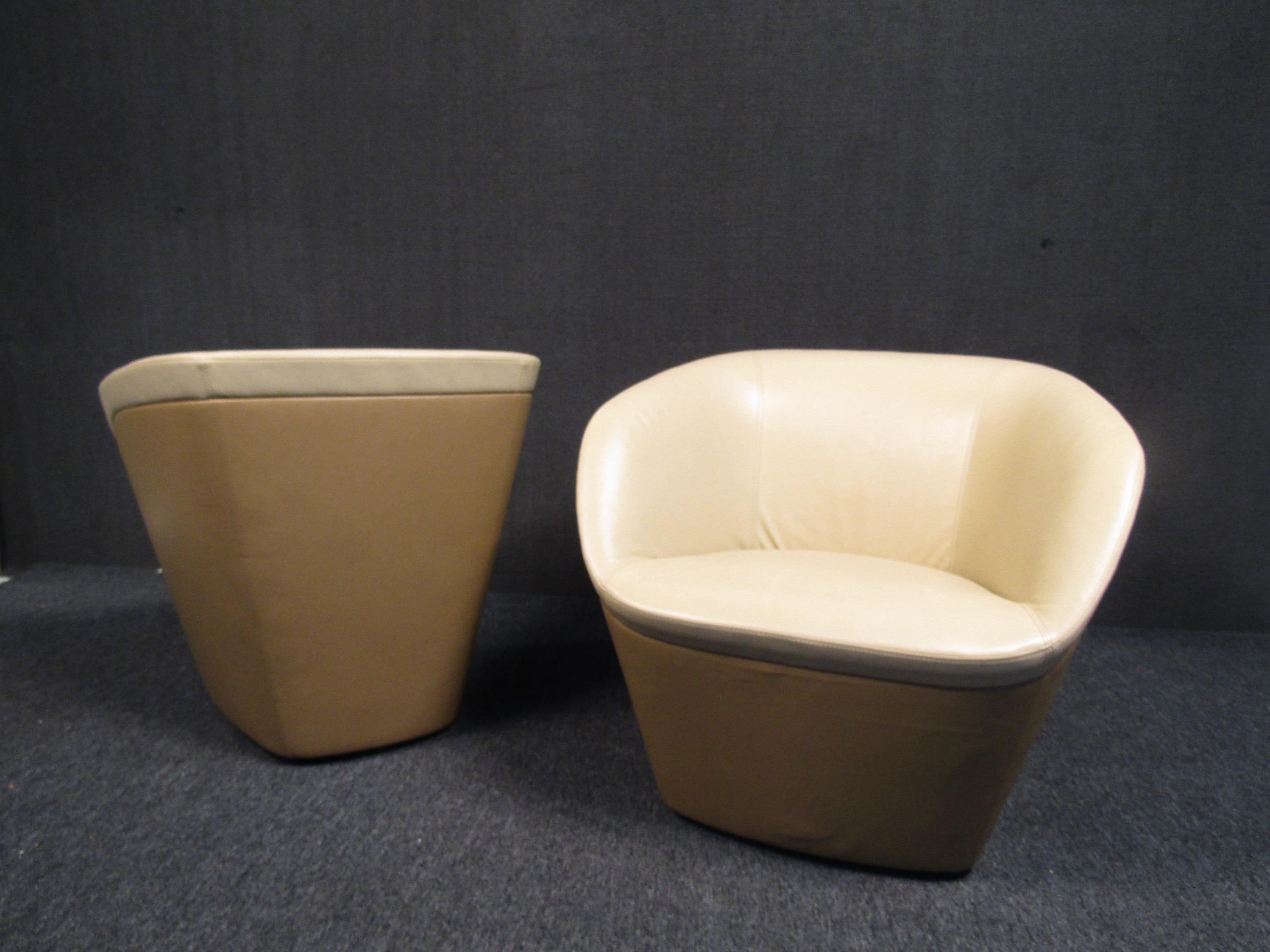 ( 2 ) Mid-Century Modern swivel tub armchairs. These lounge chairs are upholstered in stylish leather. Swivel bases give added functionality, perfect chairs for any entertainment space.

Please confirm item location (NY or NJ).
 