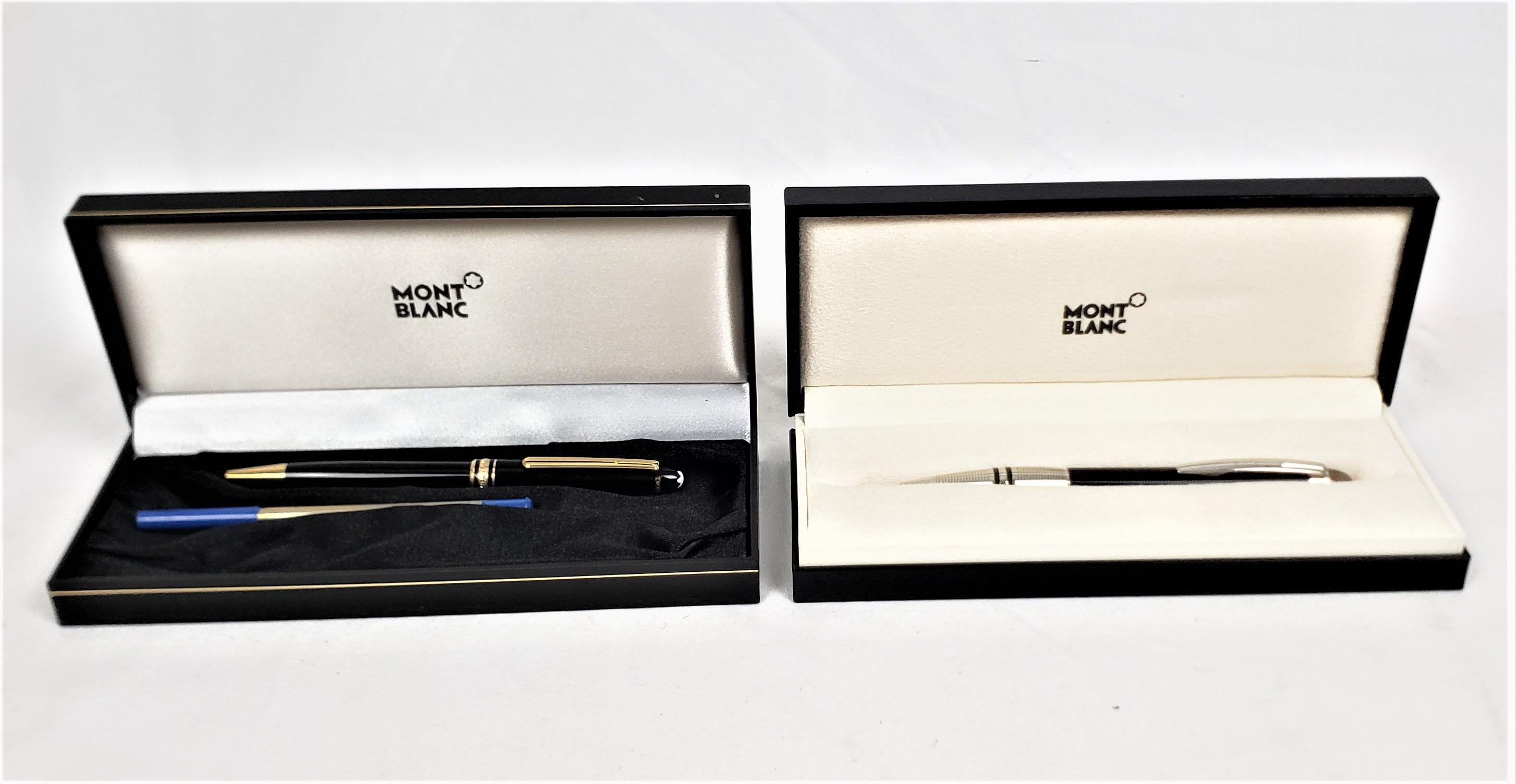 This pair of vintage rollerball pens were made by the well known Montblanc factory of Germany in approximately 1990 in their classic modern style. theiThe black cased pen from this grouping is their 