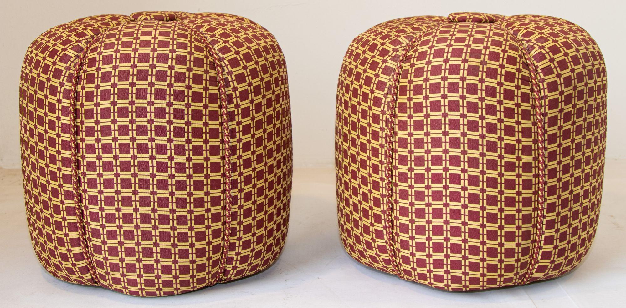 Pair of round vintage stools in red on gold fabric upholstery in the style of Jindrich Halabala for UP Závody.
Vintage Art Deco style little pouf hassock, upholstered footstool circular ottoman. 
This versatile accent piece, pouf is designed