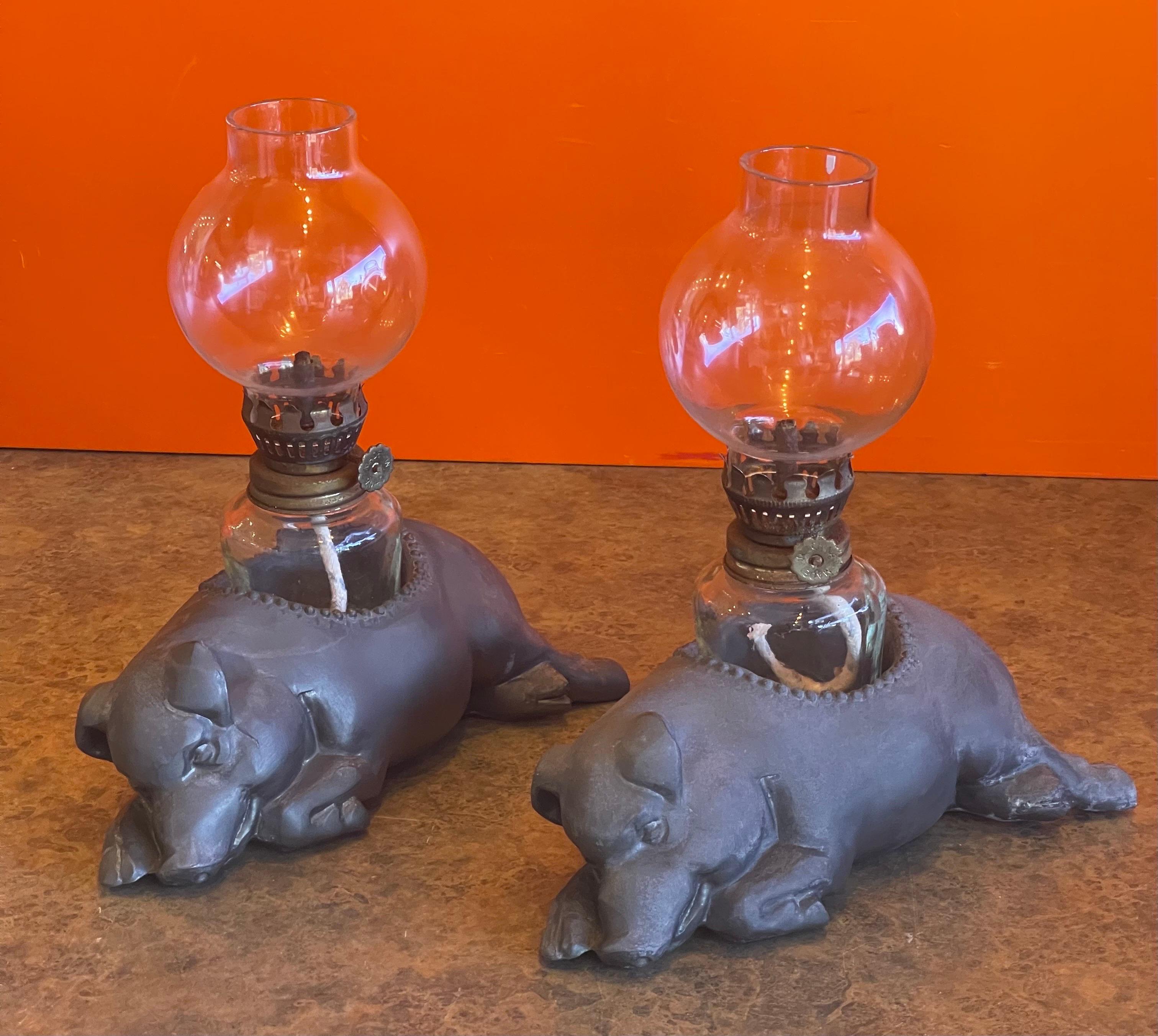Cast Pair of Vintage Morton's Steakhouse Sleeping Pig Pewter Oil Lamps