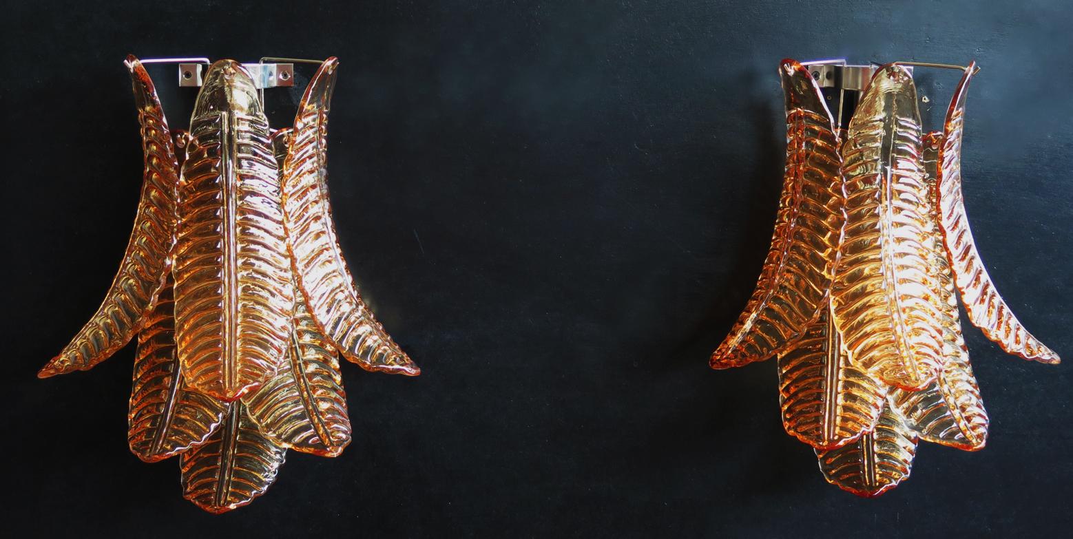 Fantastic pair of vintage Murano wall sconce made by 6 Murano Amber Felci glasses for each applique in a chrome metal frame.
Period: late 20th century
Dimensions: 18.50 inches height (47 cm), 14.60 inches width (37 cm), 9 inches depth from the