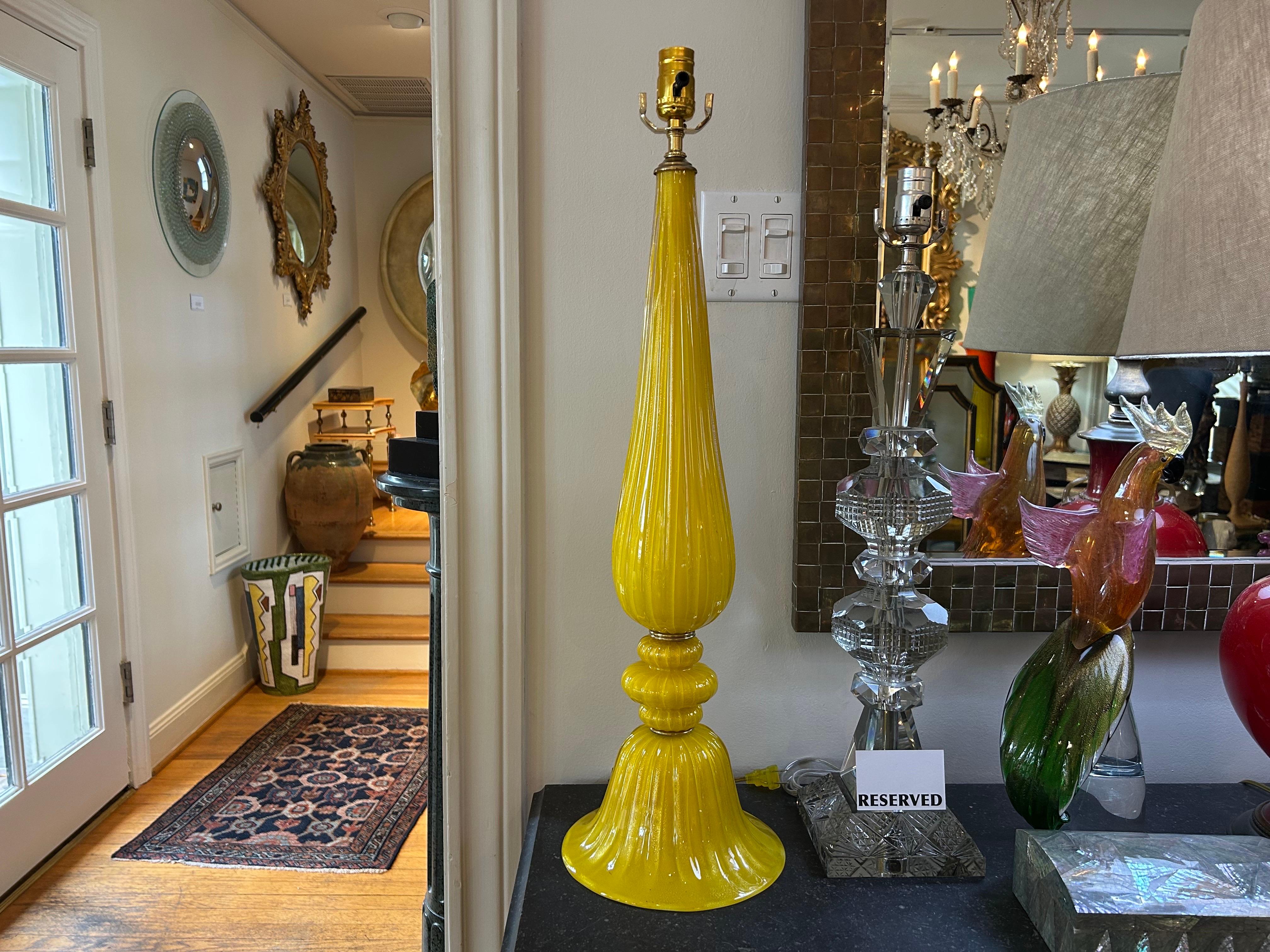 Pair Of Murano Glass Lamps.
Offered is an unusual pair of vintage Murano glass lamps created of beautifully blown yellow ribbed glass with gold inclusions. This outstanding pair of high quality Murano lamps has been newly wired for use in the U.S.
