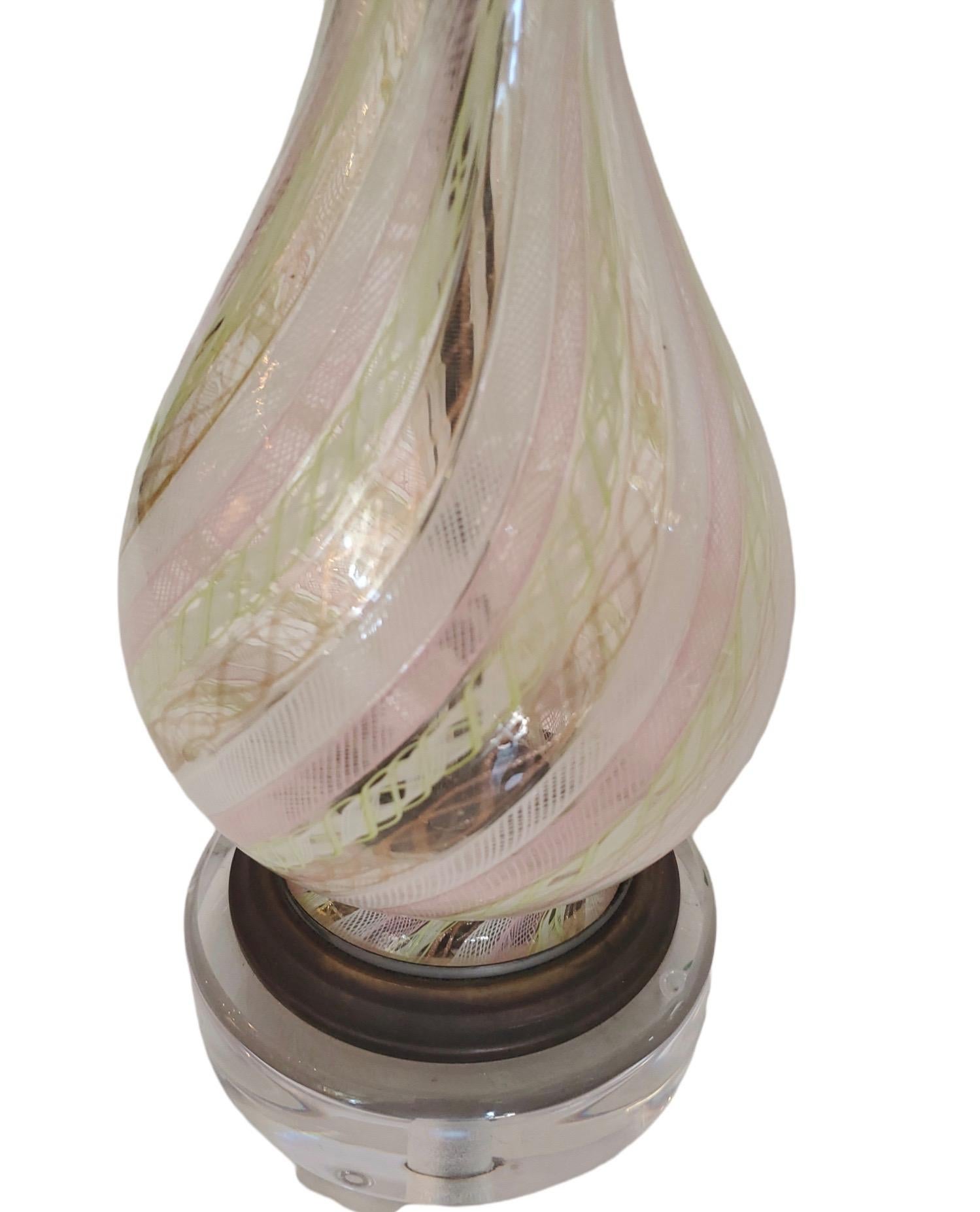 Pair of newly-wired Murano glass lamps with custom lucite base and hand crafted parchment shade. Unusual lime green with soft pink and copper flex running throughout.