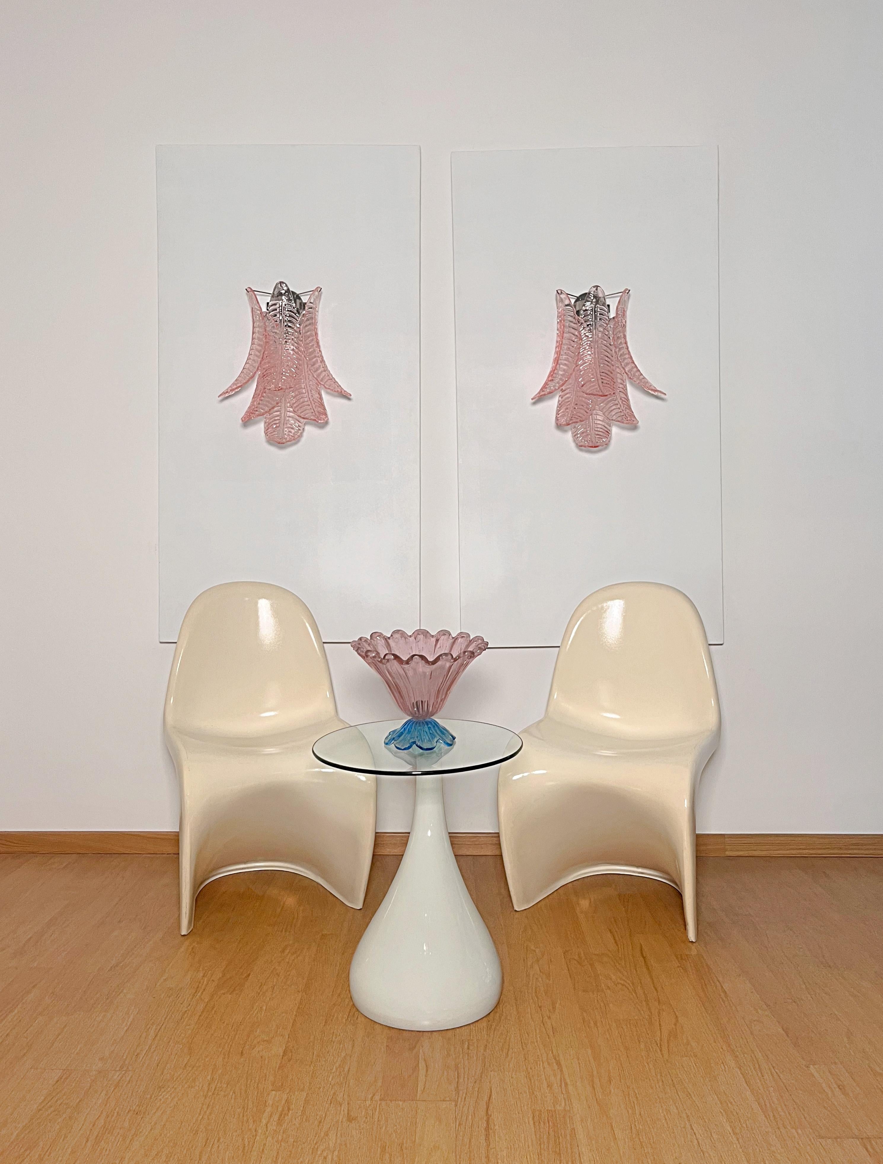 Fantastic pair of vintage Murano wall sconce made by 6 Murano pink Felci glasses for each applique in a chrome metal frame.
Period:	late xx century
Dimensions: 18,50 inches height (47 cm); 14,60 inches width (37 cm); 9 inches depth from the wall (23
