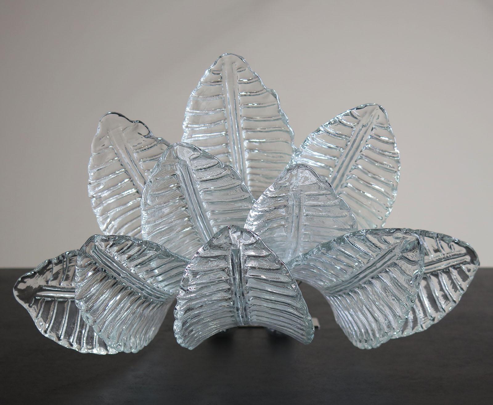 Fantastic pair of vintage Murano wall sconce made by 10 Murano transparent six-tier Felci for each applique in a chrome metal frame.
Period: 1970s
Dimensions: 18.50 inches height (47 cm), 18.50 inches width (47 cm), 13 inches depth from the wall