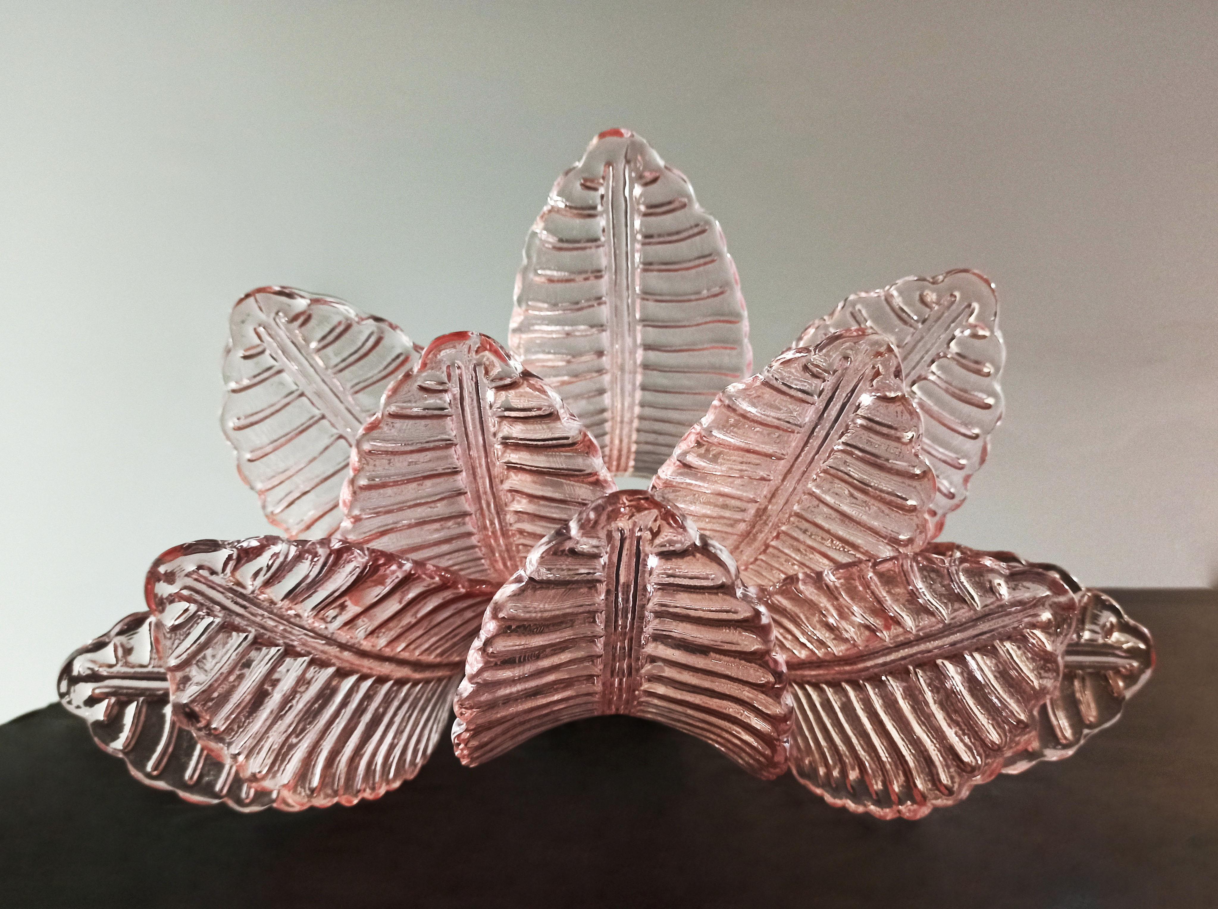 Fantastic pair of vintage Murano wall sconce made by 10 Murano pink Six-Tier Felci for each applique in a chrome metal frame. The glasses of this chandelier are real works of art.
Period: late XX century
Dimensions: 18,50 inches height (47 cm);