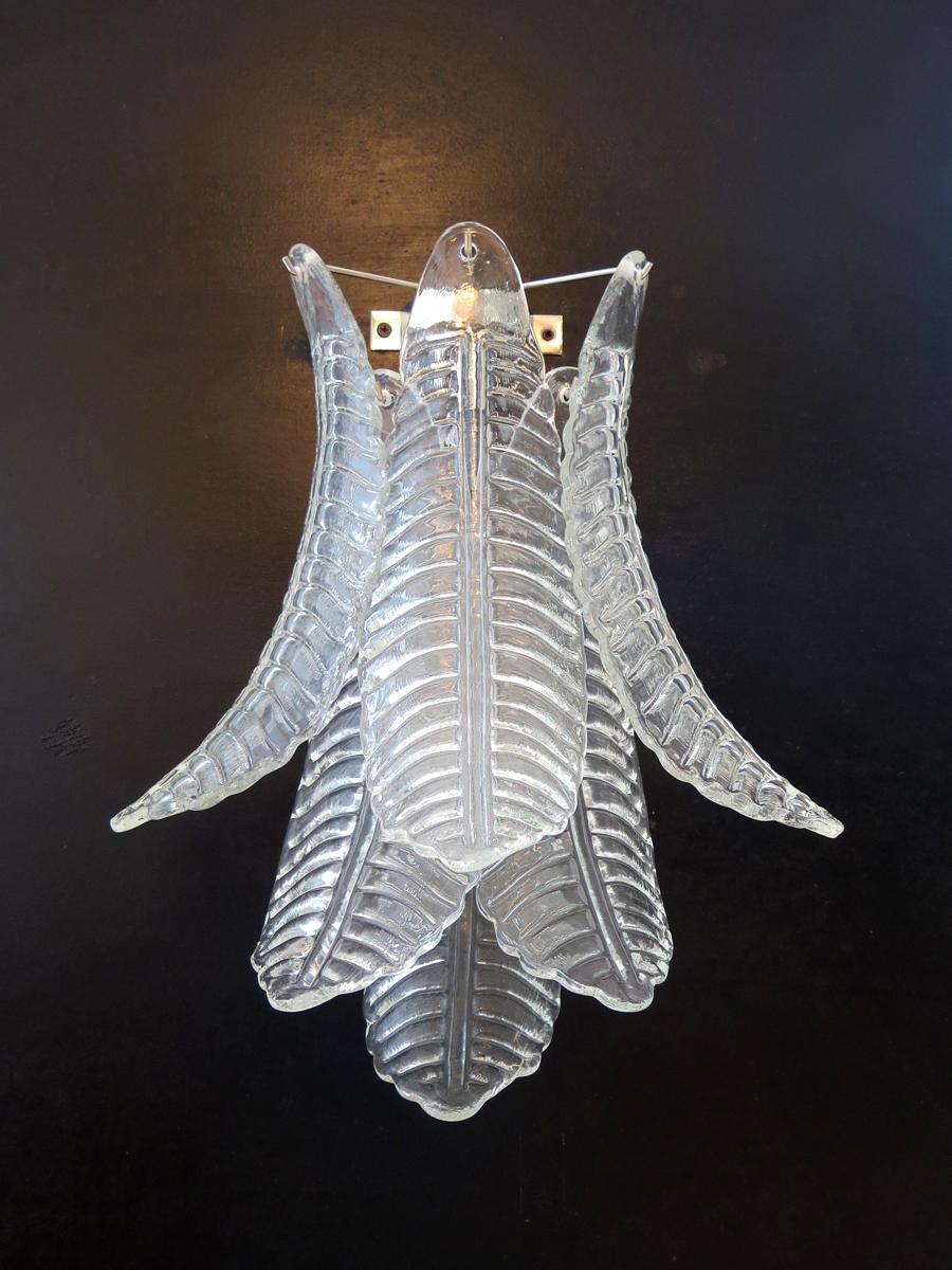 Fantastic pair of vintage Murano wall sconce made by six Murano transparent six-tier Felci for each applique in a chrome metal frame.
Period: late 20th century
Dimensions: 18.50 inches height (47 cm); 14.60 inches width (37 cm); 9 inches depth