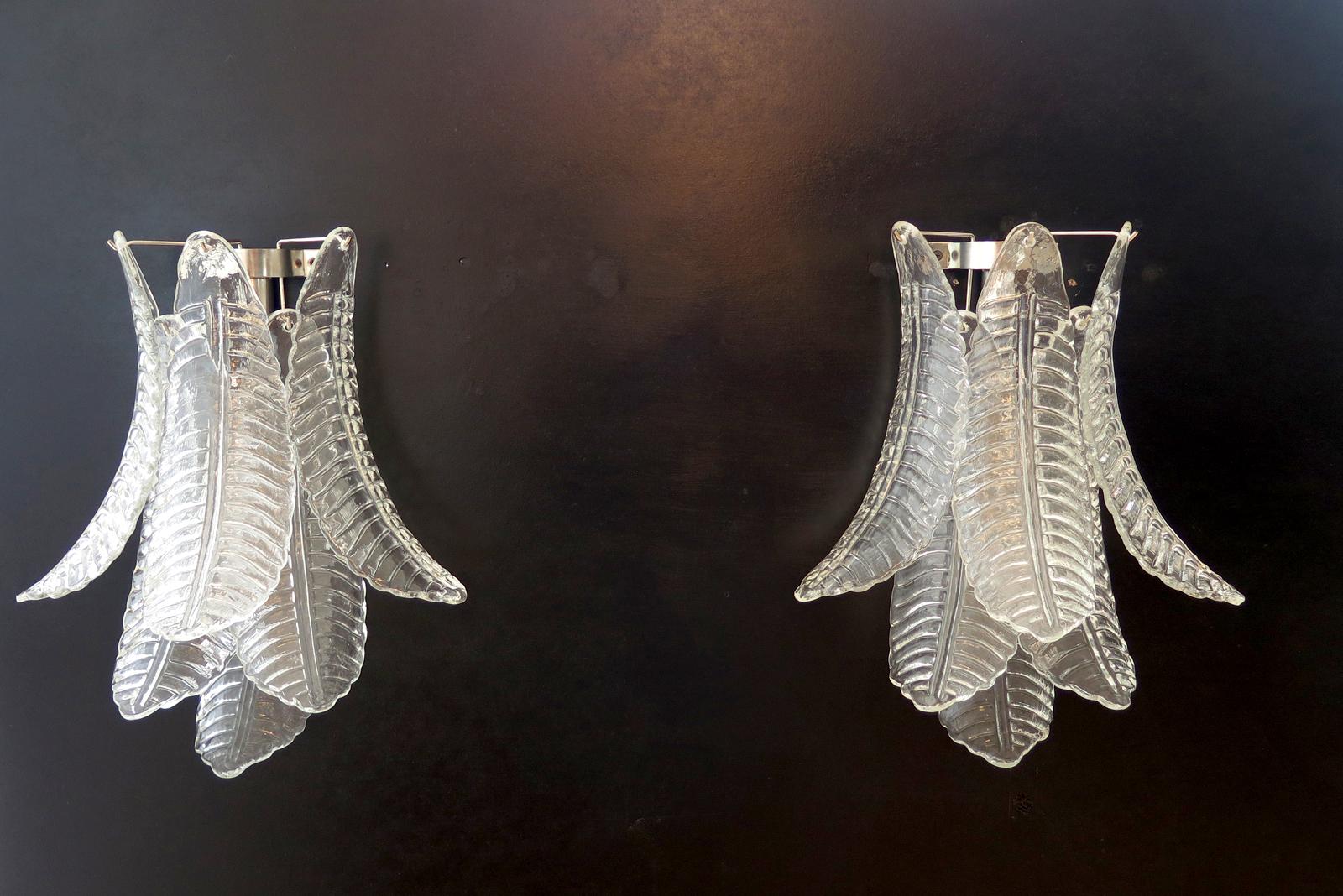 Fantastic pair of vintage Murano wall sconce made by 6 Murano trasparent Six-Tier Felci for each applique in a chrome metal frame.
Period: late xx century
Dimensions: 18,50 inches height (47 cm); 14,60 inches width (37 cm); 9 inches depth from the