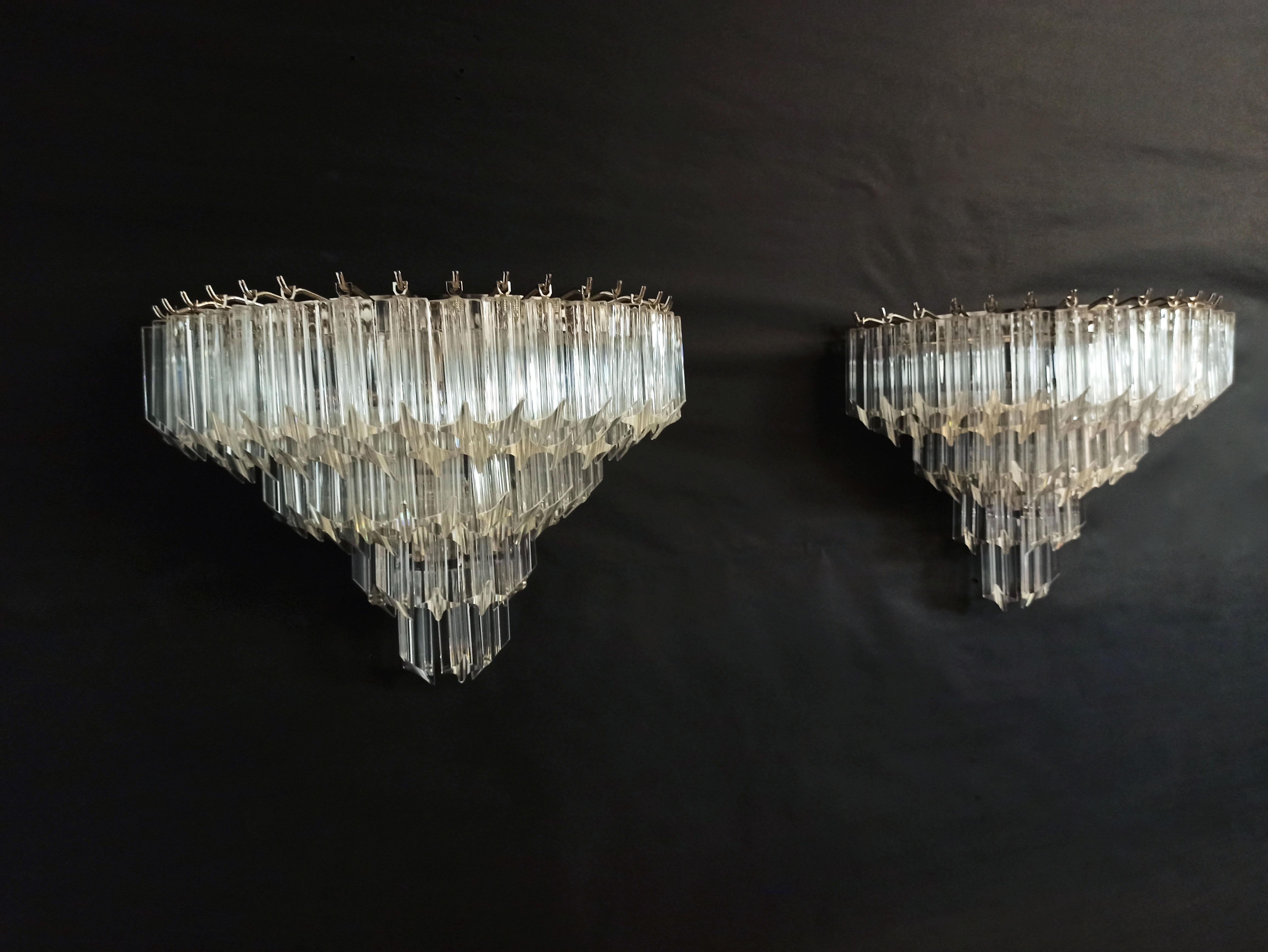 Fantastic pair of vintage Murano wall sconce made by 63 Murano crystal prism (quadriedri) for each applique in a chrome metal frame.
Period: 1980s
Dimensions: 13,60 inches height (35 cm); 16,60 inches width (43 cm); 8,15 inches depth from the wall