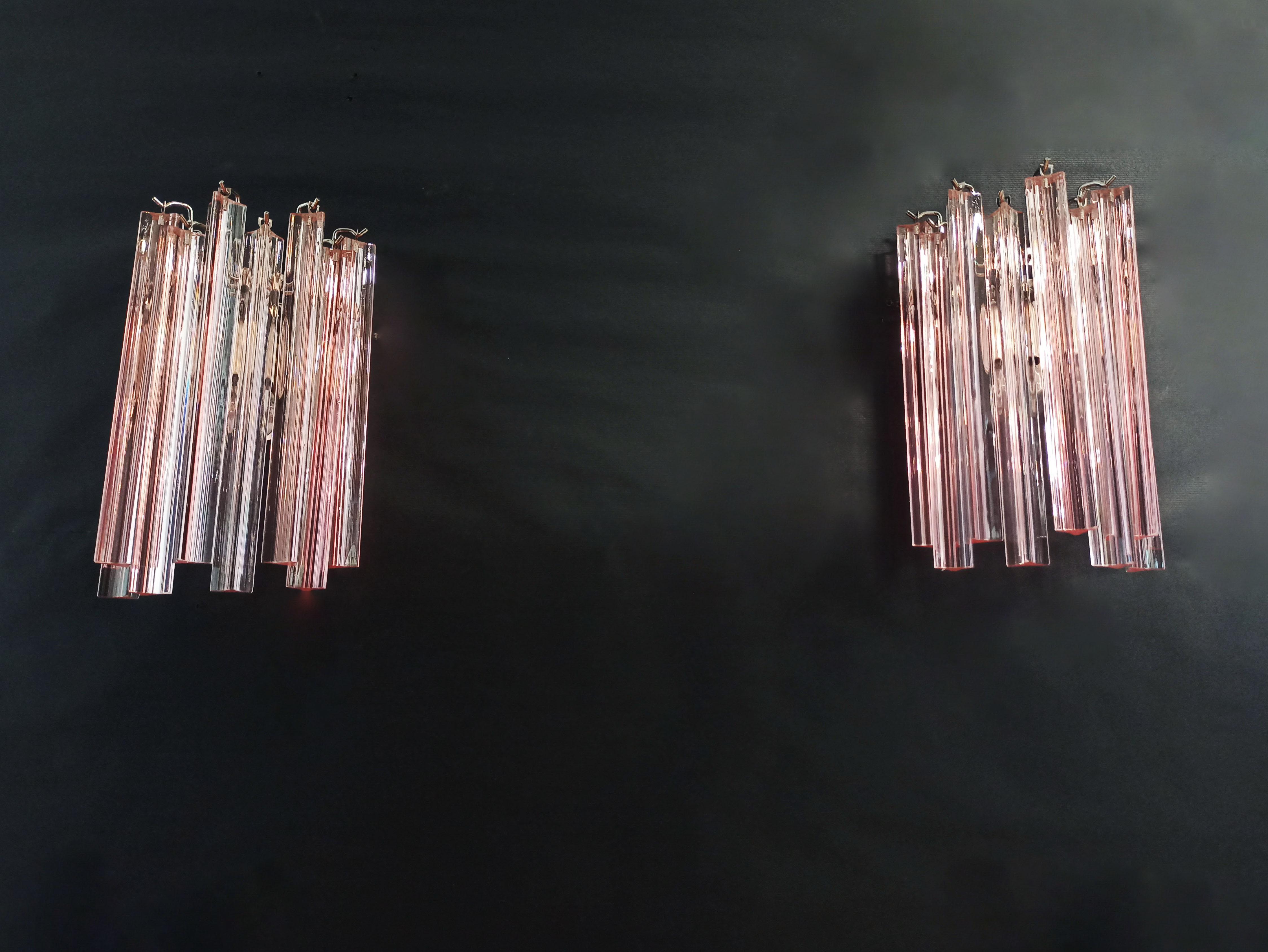 Fantastic pair of vintage Murano wall sconce made by 9 Murano pink crystal prism (triedri) for each applique in a chrome metal frame.
Period: Late 20th century
Dimensions: 12.40 inches height (32 cm), 7.8 inches width (20 cm), 5 inches depth from