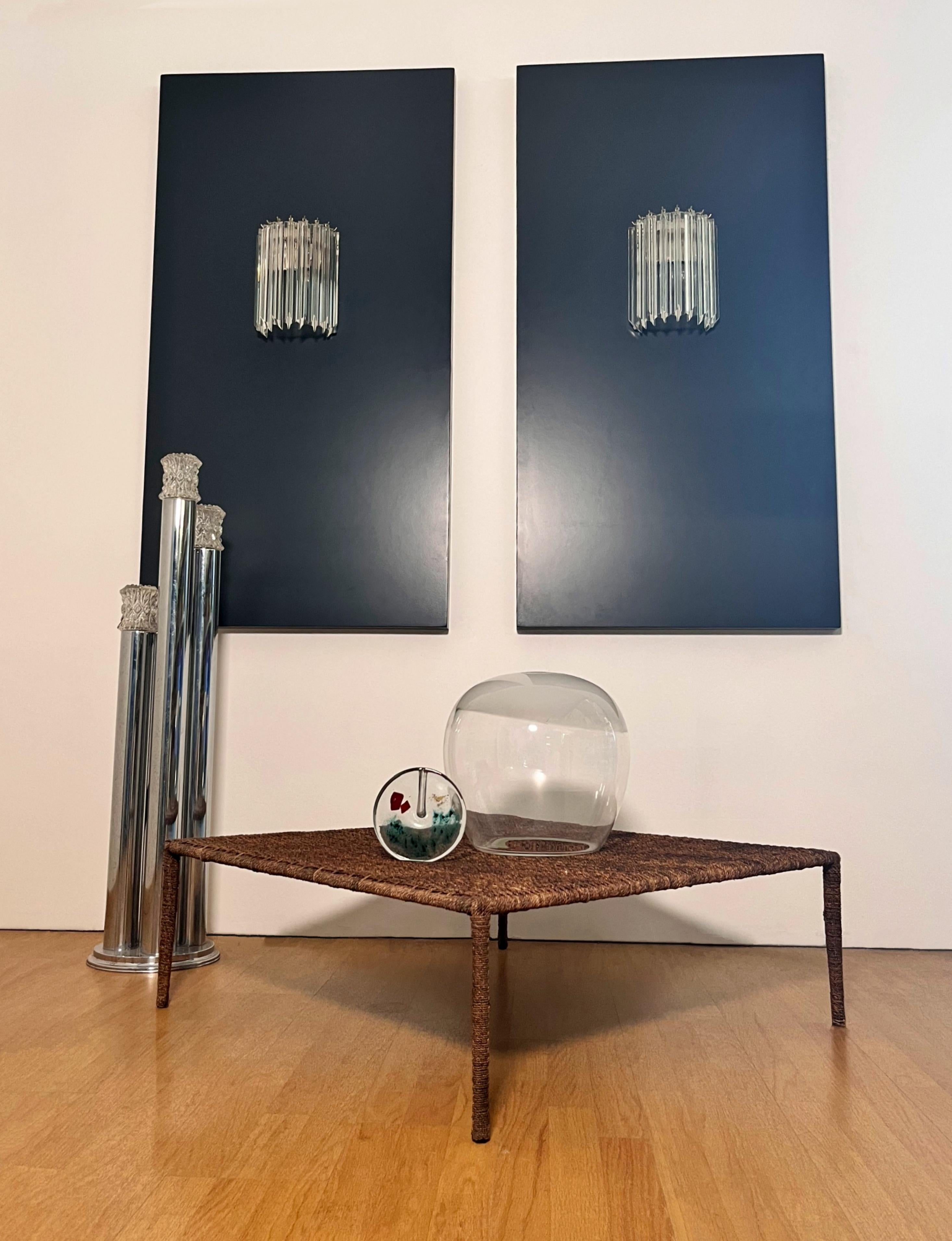 Fantastic pair of vintage Murano wall sconce made by 9 Murano crystal prism (quadriedri) for each applique in a chrome metal frame. The glasses are transparent.
Period:	late XX century
Dimensions: 11,80 inches height (30 cm); 8,70 inches width (22
