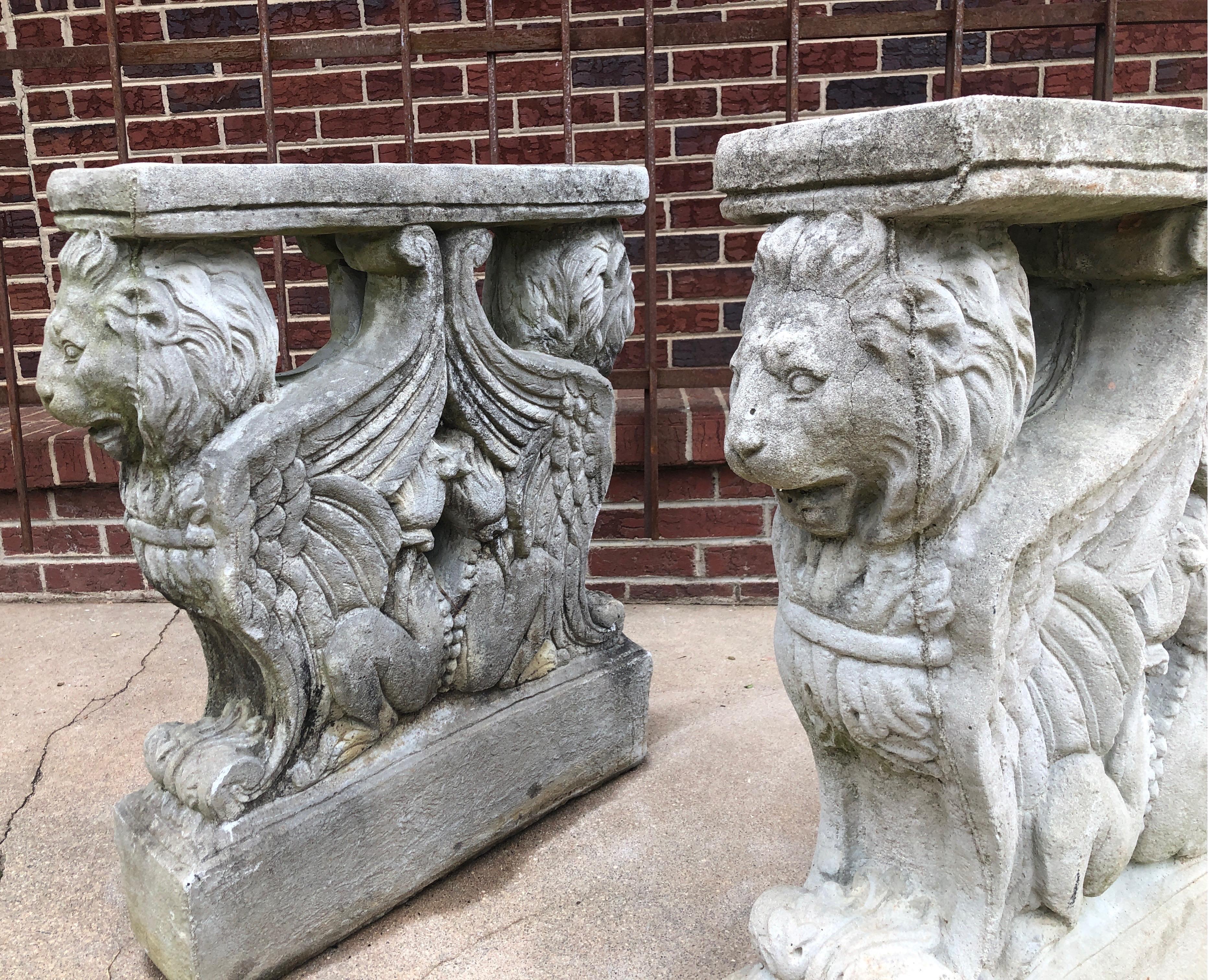 Vintage cast stone/concrete pedestal table bases. Would work indoor/outdoor as dining table, library table or console base. 

Pair of classical winged griffins. 

Stone does show signs of age and wear with minor cracks, etc. See images.