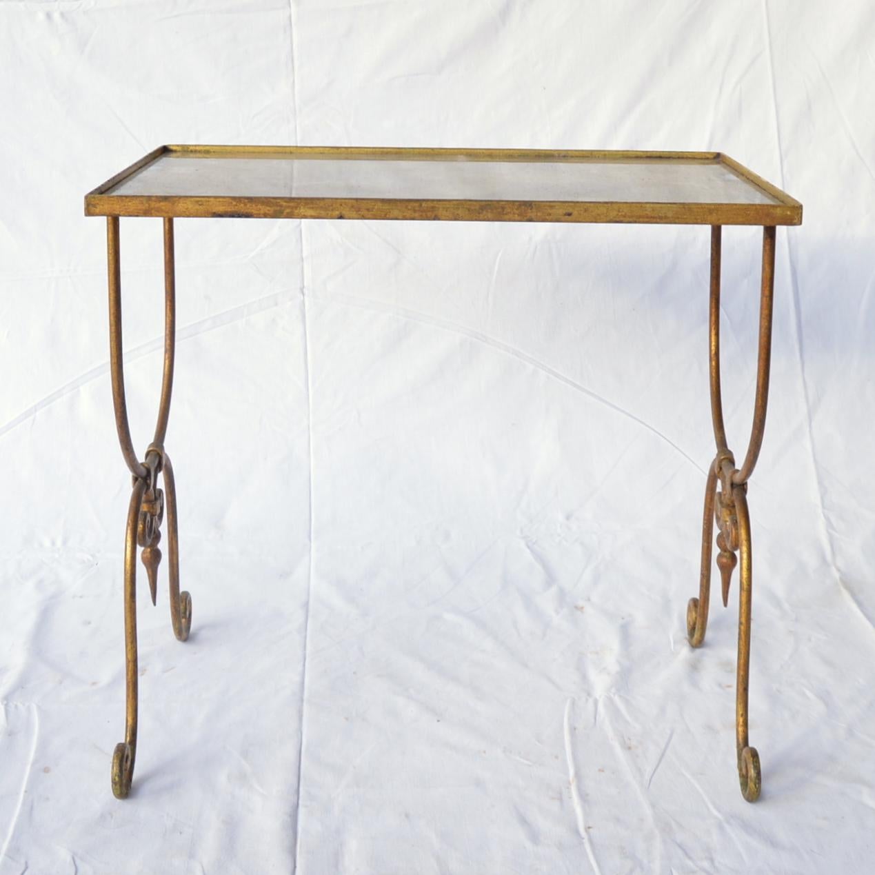 French Pair of Vintage Nesting Metal Mounted Tables with Oxidized Glass Top For Sale