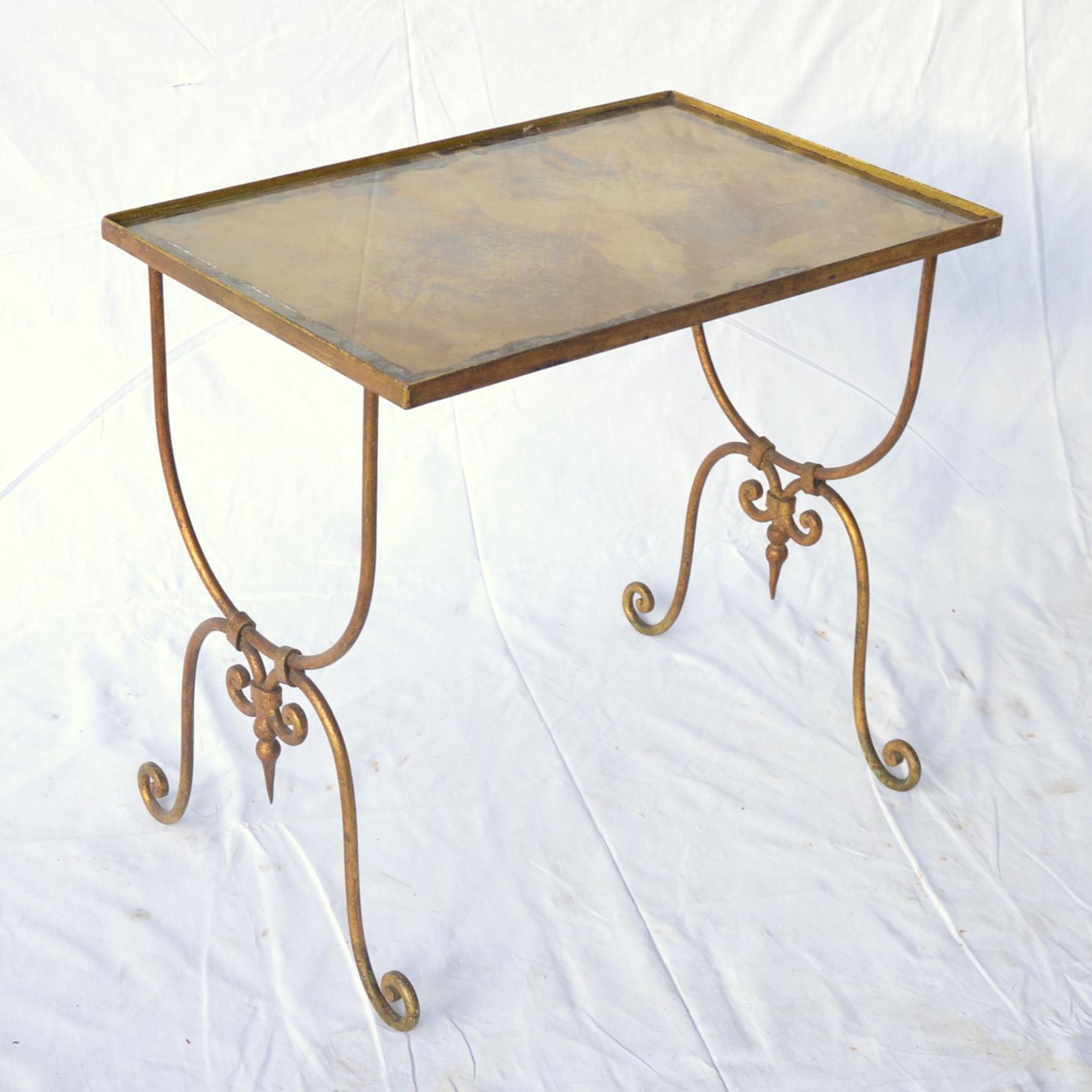 Patinated Pair of Vintage Nesting Metal Mounted Tables with Oxidized Glass Top For Sale