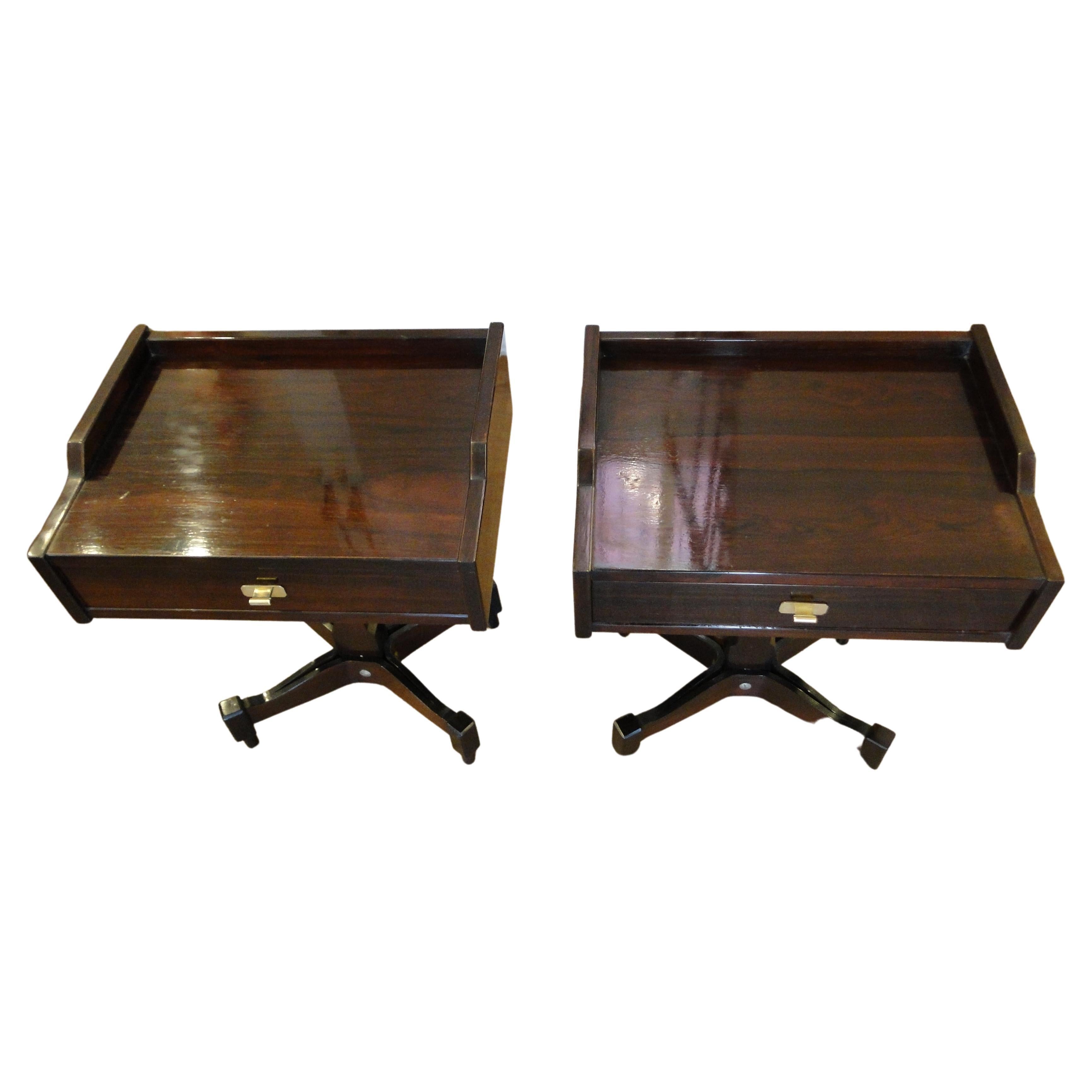 Claudio Salocchi (born in 1934) & Sormani (publisher).

Pair of walnut bedside tables

 thermoformed X base made from short cylinders,

shelf lined with a gallery, frieze drawer, brass handle.
 
Very good condition.