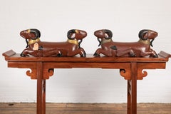 Pair of Vintage Northern Thai Double Ram Sculptures with Reddish Brown Lacquer