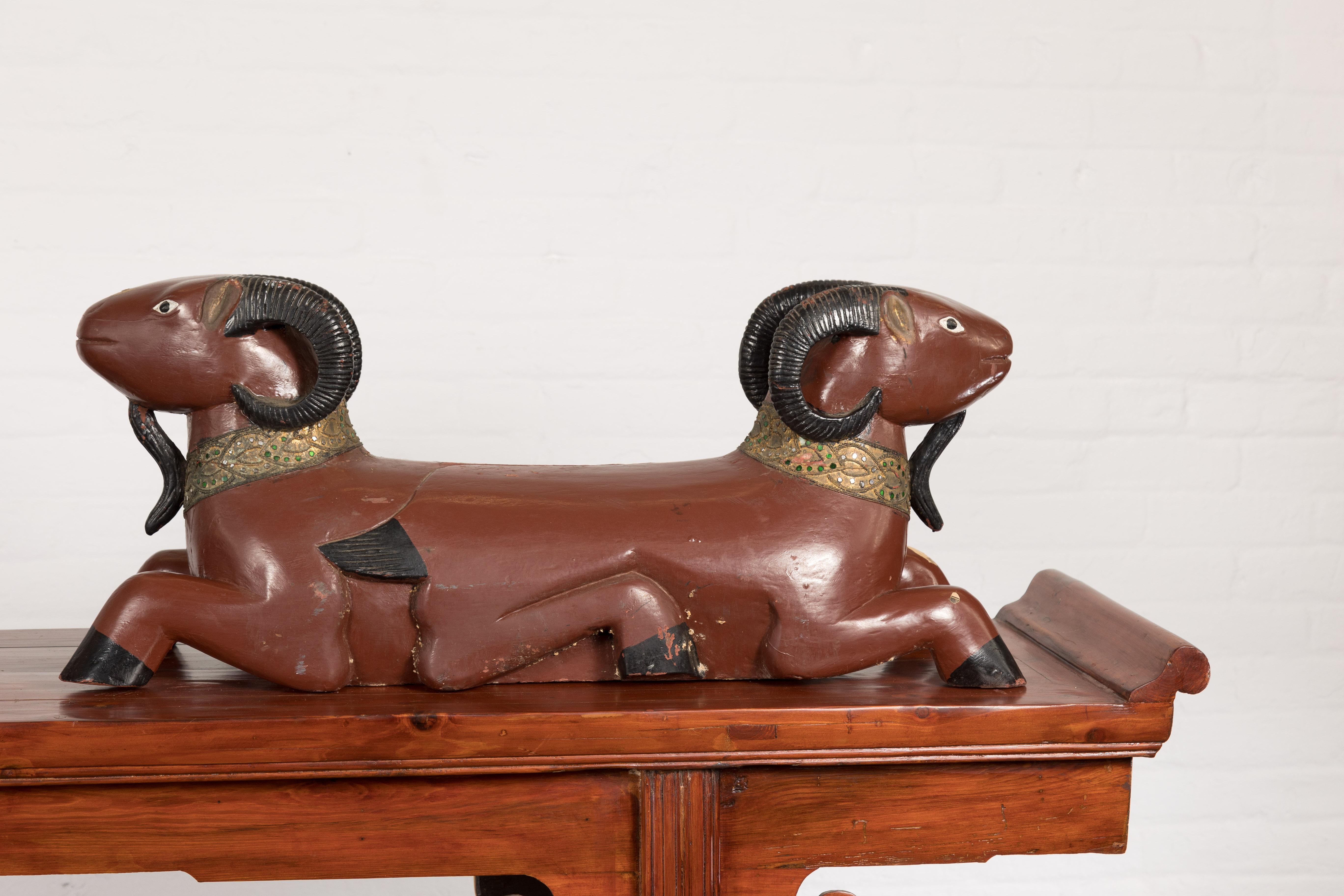 20th Century Pair of Vintage Northern Thai Double Ram Sculptures with Reddish Brown Lacquer For Sale