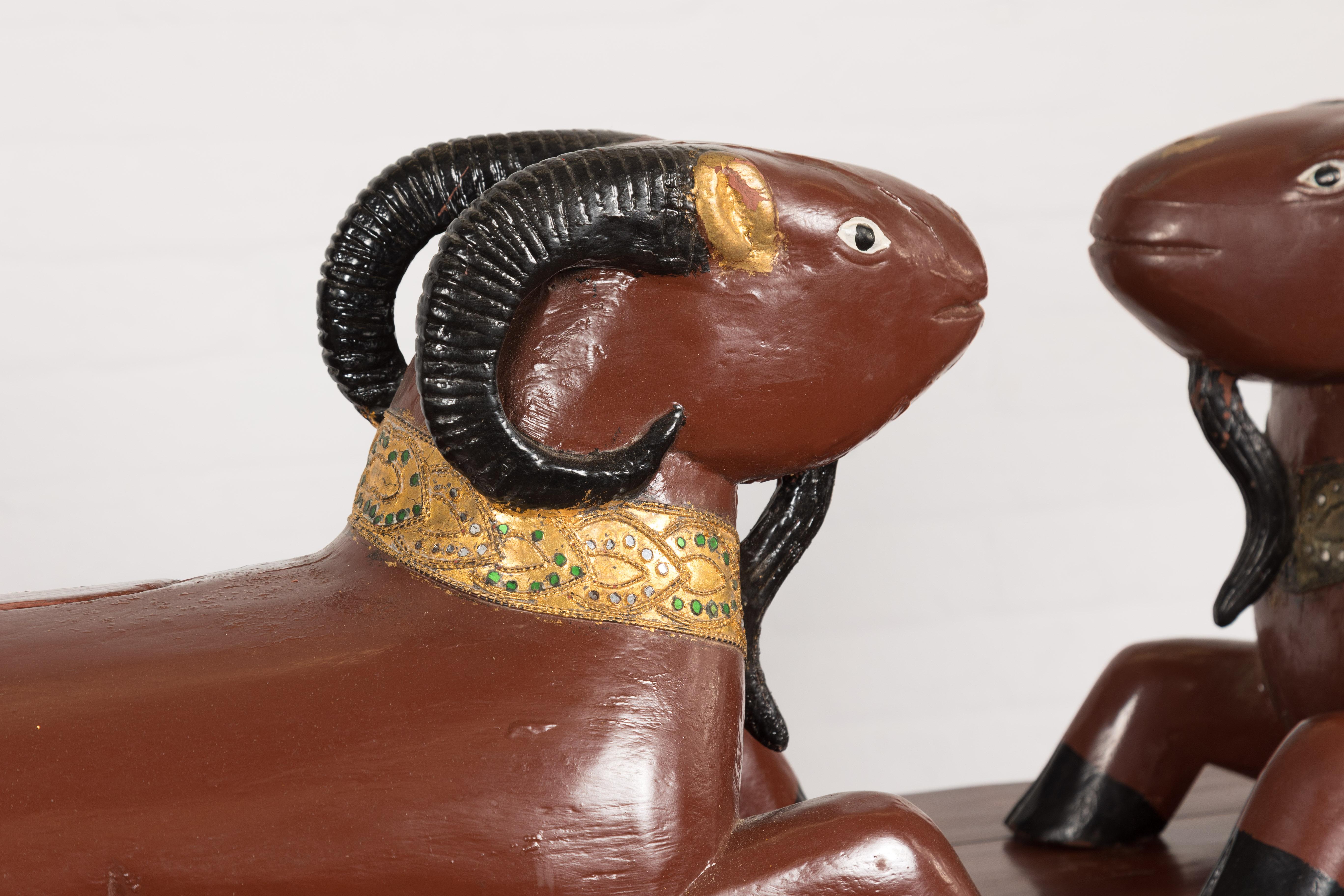 Pair of Vintage Northern Thai Double Ram Sculptures with Reddish Brown Lacquer For Sale 1